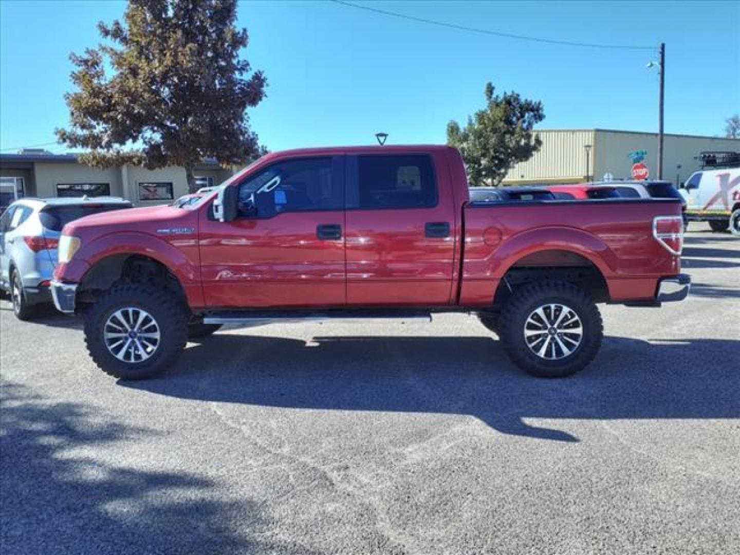 2009 Royal Red Clearcoat Metallic Uk Ford F-150 XLT (1FTRW12879F) with an 4.6L 4.6L 3V V8 292hp 320ft. lbs. Sequential Multiport Fuel Injection engine, 6-Speed Automatic transmission, located at 1401 N. Hobart, Pampa, TX, 79065, (806) 665-9872, 35.549953, -100.975098 - Photo#4