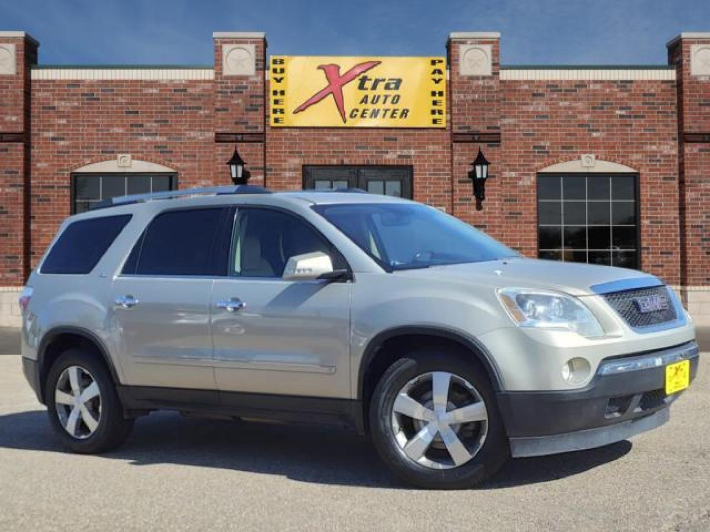 2010 Gold Mist Metallic GMC Acadia SLT-1 (1GKLRMED2AJ) with an 3.6L 3.6L V6 288hp 270ft. lbs. Fuel Injected engine, 6-Speed Shiftable Automatic transmission, located at 1401 N. Hobart, Pampa, TX, 79065, (806) 665-9872, 35.549953, -100.975098 - Photo#0