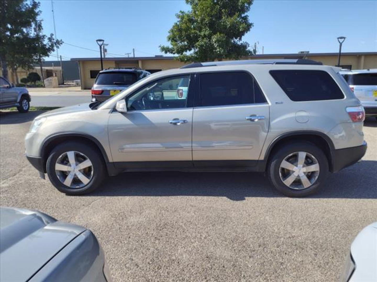 2010 Gold Mist Metallic GMC Acadia SLT-1 (1GKLRMED2AJ) with an 3.6L 3.6L V6 288hp 270ft. lbs. Fuel Injected engine, 6-Speed Shiftable Automatic transmission, located at 1401 N. Hobart, Pampa, TX, 79065, (806) 665-9872, 35.549953, -100.975098 - Photo#4