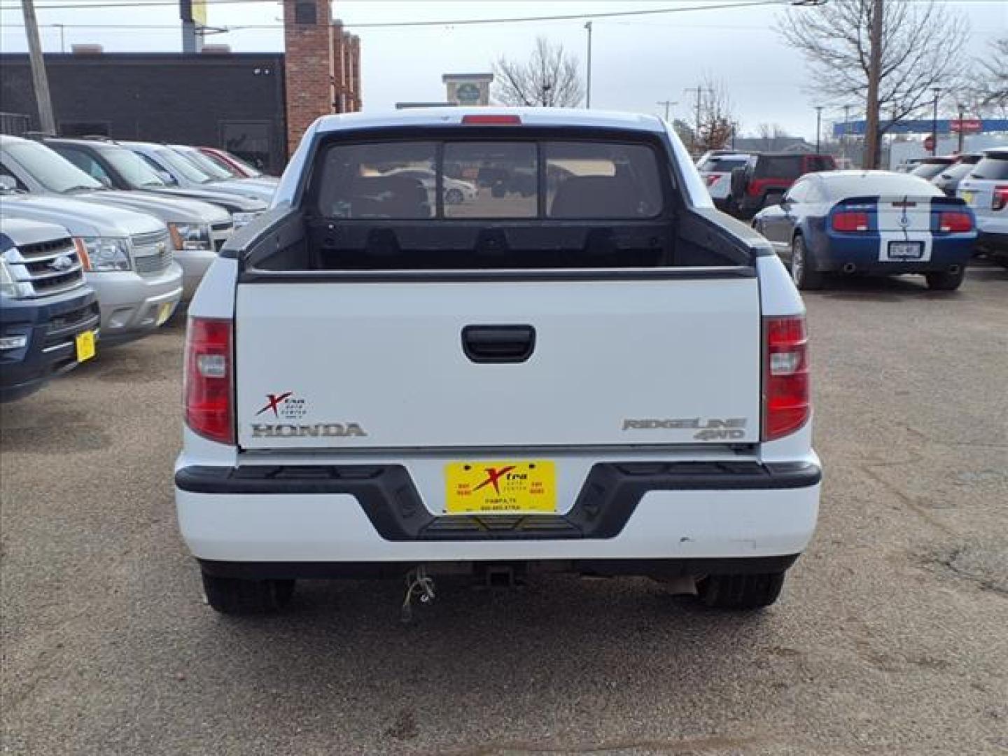 2010 White Honda Ridgeline RT (5FPYK1F29AB) with an 3.5L 6 Cylinder Fuel Injected engine, Automatic transmission, located at 1401 N. Hobart, Pampa, TX, 79065, (806) 665-9872, 35.549953, -100.975098 - Photo#3