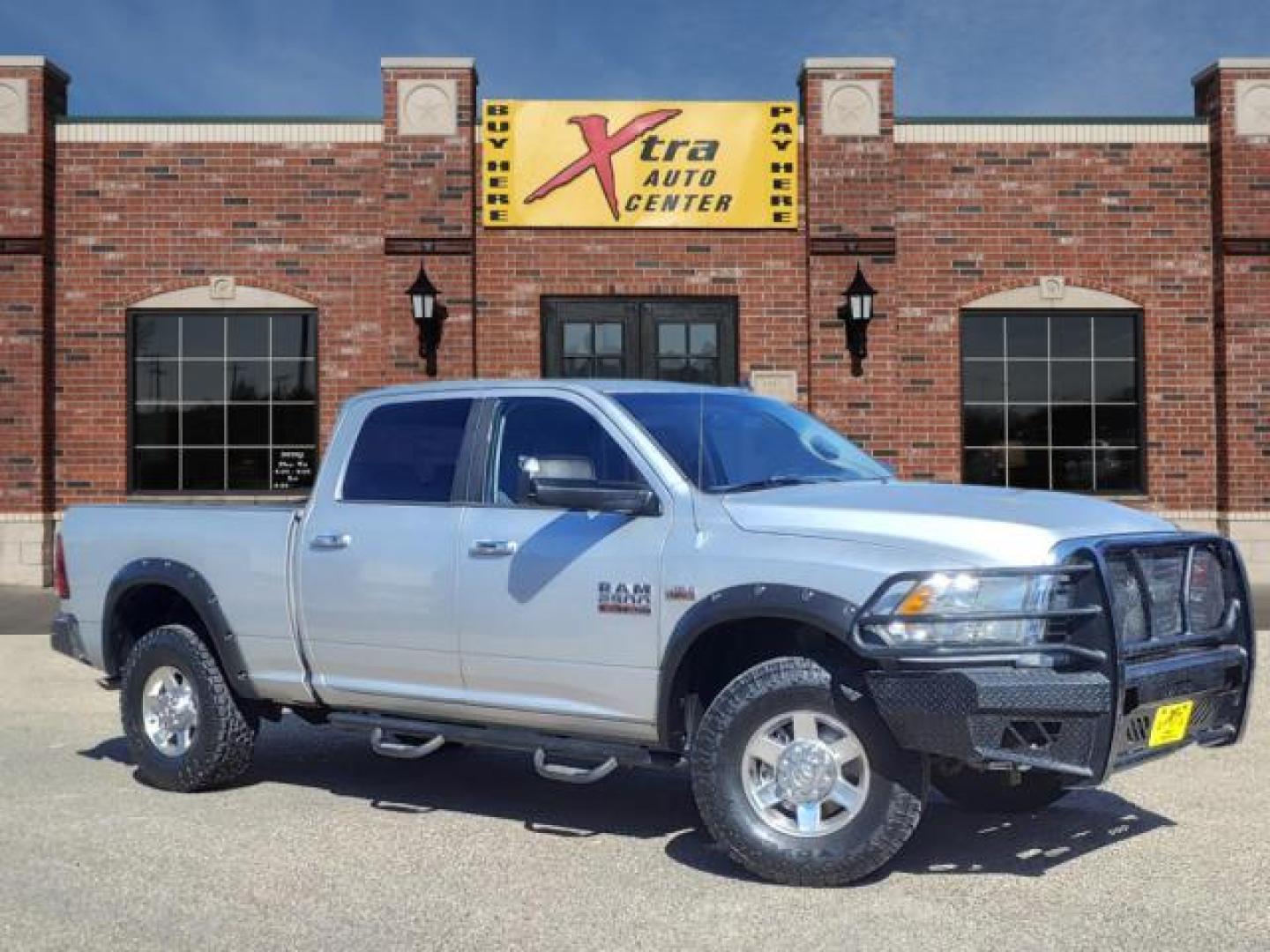 2013 Bright Silver Metallic Clear Coat RAM 2500 Lone Star (3C6TR5DT9DG) with an 5.7L HEMI 5.7L V8 383hp 400ft. lbs. Sequential Multiport Fuel Injection engine, 6-Speed Shiftable Automatic transmission, located at 1401 N. Hobart, Pampa, TX, 79065, (806) 665-9872, 35.549953, -100.975098 - Photo#0