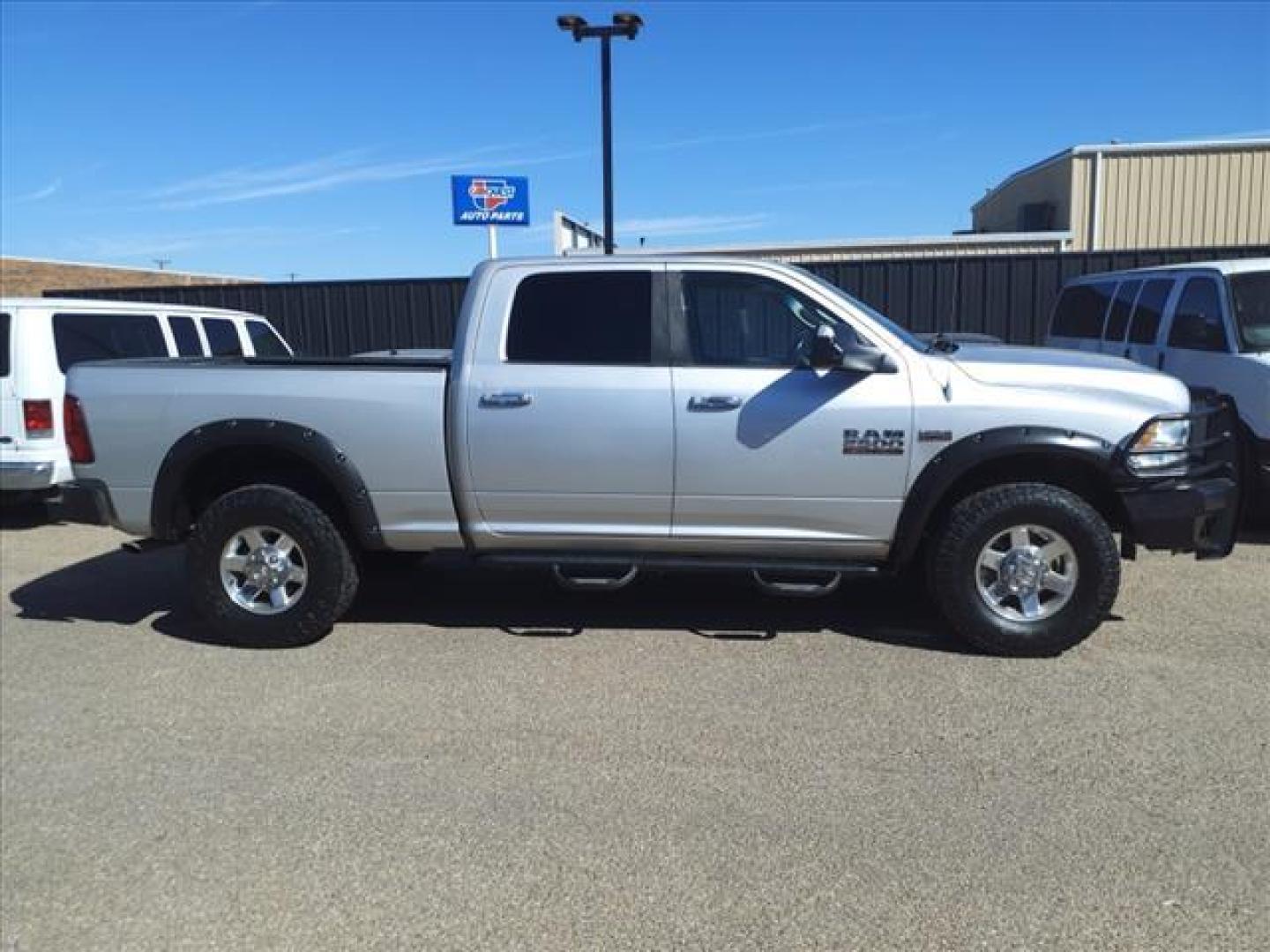 2013 Bright Silver Metallic Clear Coat RAM 2500 Lone Star (3C6TR5DT9DG) with an 5.7L HEMI 5.7L V8 383hp 400ft. lbs. Sequential Multiport Fuel Injection engine, 6-Speed Shiftable Automatic transmission, located at 1401 N. Hobart, Pampa, TX, 79065, (806) 665-9872, 35.549953, -100.975098 - Photo#2