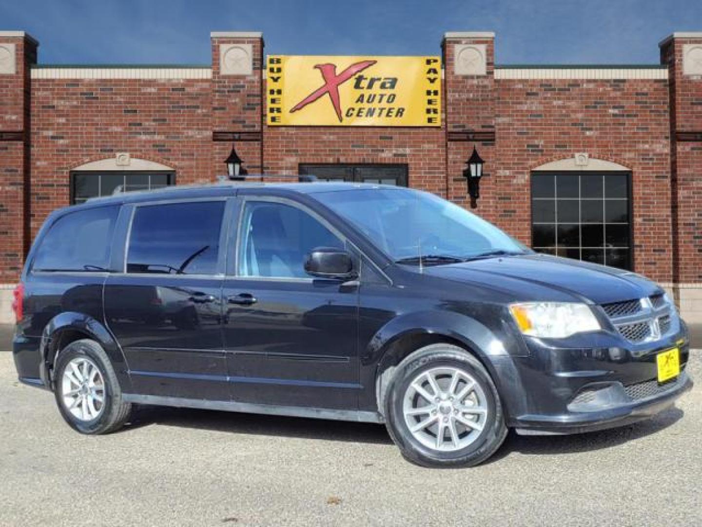 2014 Brilliant Black Crystal Pearl Coat Pxr Dodge Grand Caravan SXT (2C4RDGCGXER) with an 3.6L Pentastar 3.6L Flex Fuel V6 283hp 260ft. lbs. Sequential Multiport Fuel Injection engine, 6-Speed Shiftable Automatic transmission, located at 1401 N. Hobart, Pampa, TX, 79065, (806) 665-9872, 35.549953, -100.975098 - Photo#0