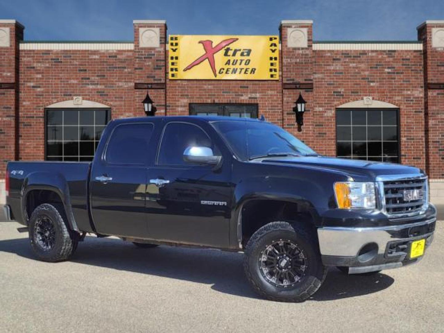 2011 Onyx Black GMC Sierra 1500 SLE (3GTP2VE35BG) with an 5.3L Vortec 5.3L Flex Fuel V8 315hp 335ft. lbs. Sequential-Port F.I. engine, 6-Speed Shiftable Automatic transmission, located at 1401 N. Hobart, Pampa, TX, 79065, (806) 665-9872, 35.549953, -100.975098 - Photo#0