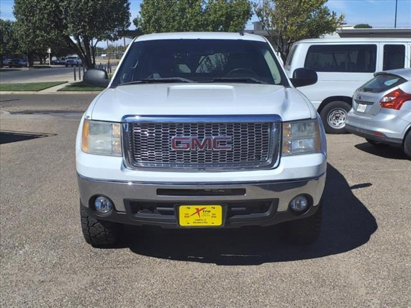 2011 Summit White GMC Sierra 1500 SLE (3GTU2VE25BG) with an 6.2L Vortec 6.2L Flex Fuel V8 403hp 417ft. lbs. Sequential-Port F.I. engine, 6-Speed Shiftable Automatic transmission, located at 1401 N. Hobart, Pampa, TX, 79065, (806) 665-9872, 35.549953, -100.975098 - Photo#1