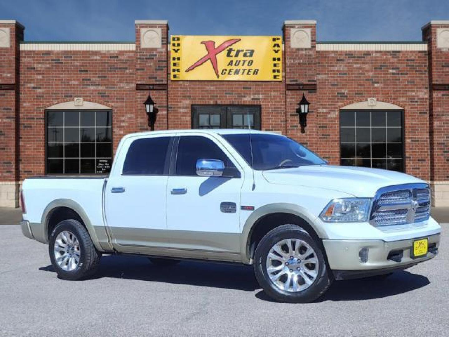 2015 Bright White Clear Coat/White Gold Clear Coat RAM 1500 Laramie Longhorn (1C6RR7PM3FS) with an 3.0L Biodiesel Turbo V6 240hp 420ft. lbs. Common Rail Direct Injection engine, 8-Speed Shiftable Automatic transmission, located at 1401 N. Hobart, Pampa, TX, 79065, (806) 665-9872, 35.549953, -100.975098 - Photo#0