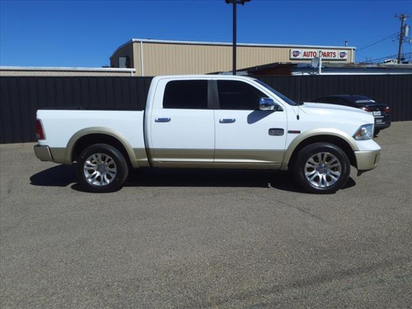 2015 Bright White Clear Coat/White Gold Clear Coat RAM 1500 Laramie Longhorn (1C6RR7PM3FS) with an 3.0L Biodiesel Turbo V6 240hp 420ft. lbs. Common Rail Direct Injection engine, 8-Speed Shiftable Automatic transmission, located at 1401 N. Hobart, Pampa, TX, 79065, (806) 665-9872, 35.549953, -100.975098 - Photo#2