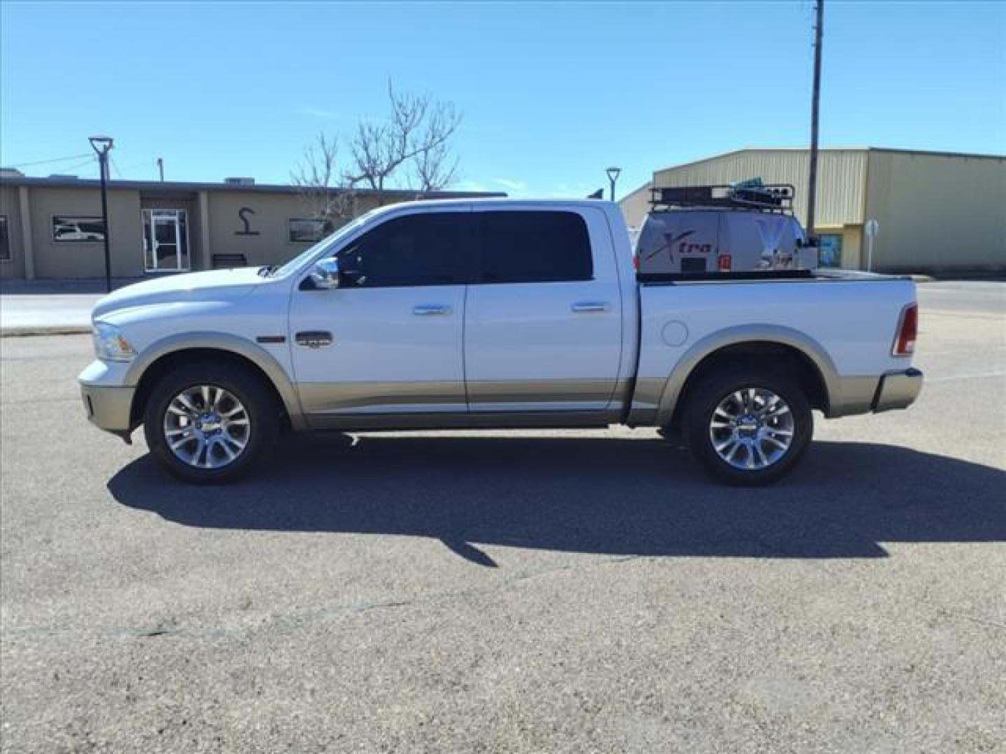 2015 Bright White Clear Coat/White Gold Clear Coat RAM 1500 Laramie Longhorn (1C6RR7PM3FS) with an 3.0L Biodiesel Turbo V6 240hp 420ft. lbs. Common Rail Direct Injection engine, 8-Speed Shiftable Automatic transmission, located at 1401 N. Hobart, Pampa, TX, 79065, (806) 665-9872, 35.549953, -100.975098 - Photo#4