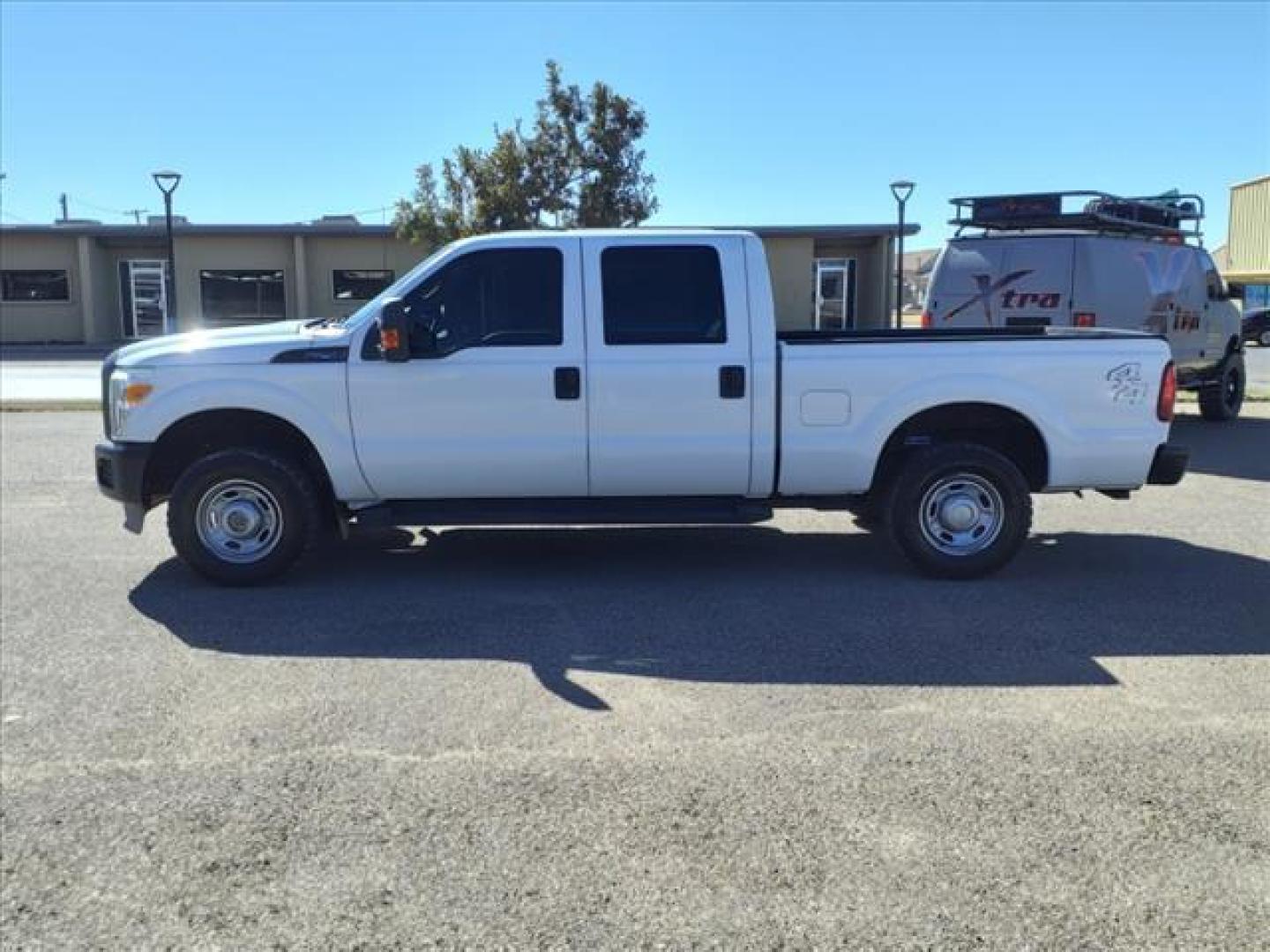 2012 Oxford White Ford F-250 Super Duty XL (1FT7W2B60CE) with an 6.2L 6.2L Flex Fuel V8 385hp 405ft. lbs. Sequential Electronic Fuel Injection engine, 6-Speed Shiftable Automatic transmission, located at 1401 N. Hobart, Pampa, TX, 79065, (806) 665-9872, 35.549953, -100.975098 - Photo#4