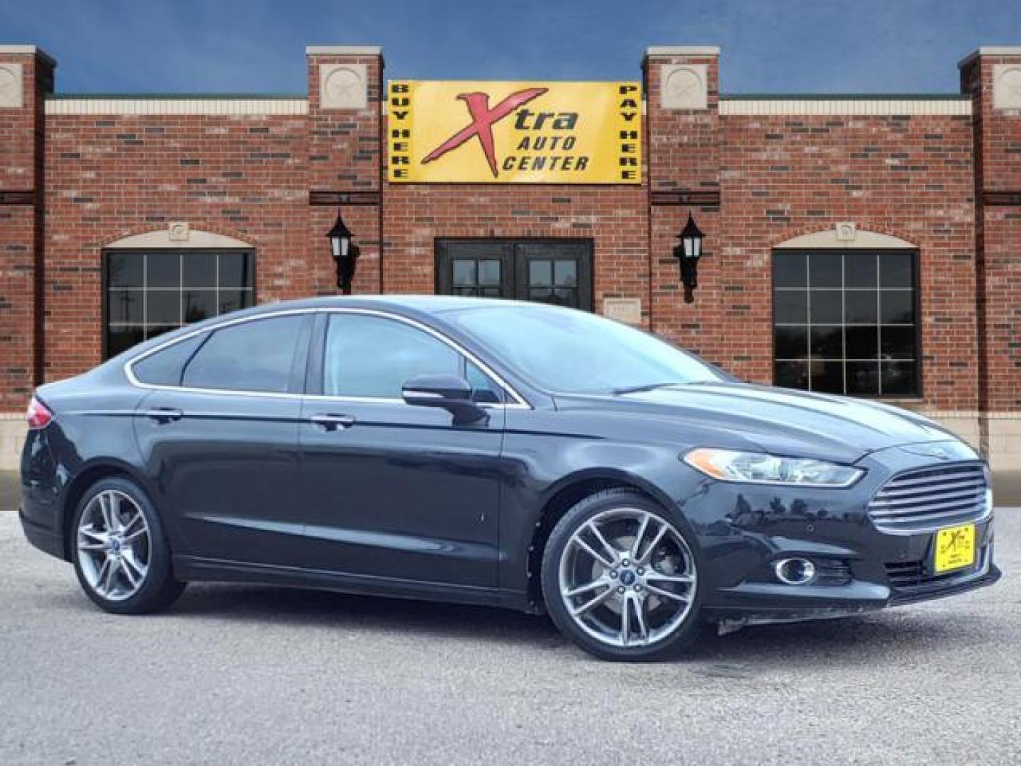 2013 Tuxedo Black Metallic Ford Fusion Titanium (3FA6P0K99DR) with an 2.0L EcoBoost 2.0L Turbo I4 240hp 270ft. lbs. Direct Injection engine, 6-Speed Shiftable Automatic transmission, located at 1401 N. Hobart, Pampa, TX, 79065, (806) 665-9872, 35.549953, -100.975098 - Photo#0