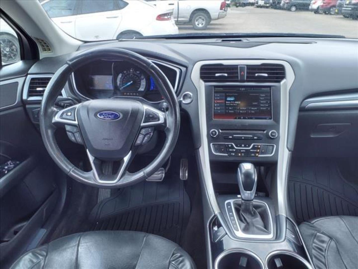 2013 Tuxedo Black Metallic Ford Fusion Titanium (3FA6P0K99DR) with an 2.0L EcoBoost 2.0L Turbo I4 240hp 270ft. lbs. Direct Injection engine, 6-Speed Shiftable Automatic transmission, located at 1401 N. Hobart, Pampa, TX, 79065, (806) 665-9872, 35.549953, -100.975098 - Photo#11