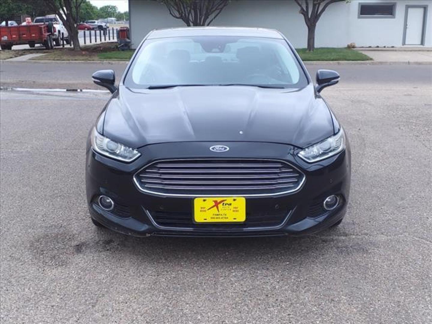 2013 Tuxedo Black Metallic Ford Fusion Titanium (3FA6P0K99DR) with an 2.0L EcoBoost 2.0L Turbo I4 240hp 270ft. lbs. Direct Injection engine, 6-Speed Shiftable Automatic transmission, located at 1401 N. Hobart, Pampa, TX, 79065, (806) 665-9872, 35.549953, -100.975098 - Photo#1