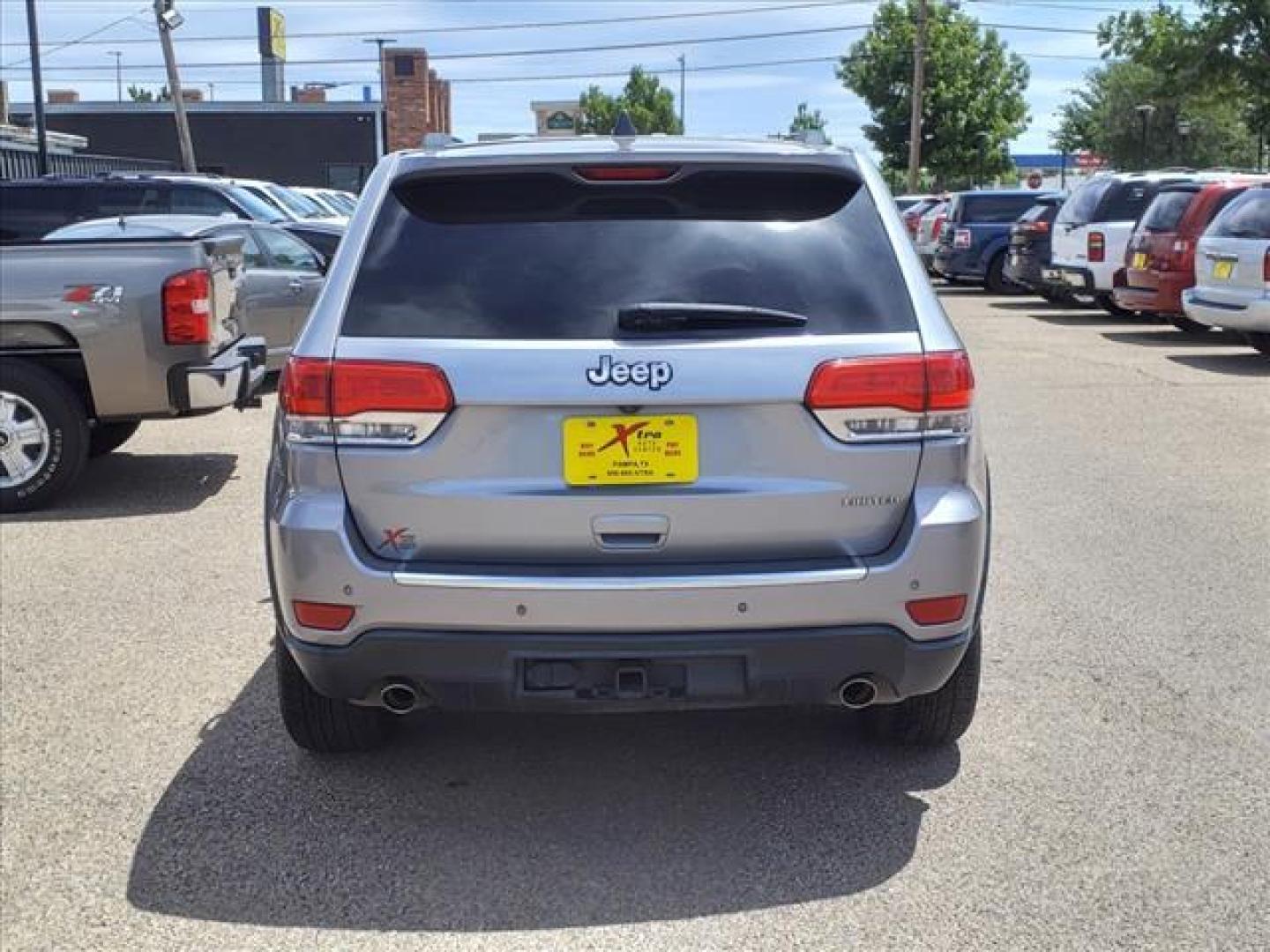 2014 Billet Silver Metallic Clear Coat Jeep Grand Cherokee Limited (1C4RJEBG2EC) with an 3.6L 3.6L V6 290hp 260ft. lbs. Sequential Multiport Fuel Injection engine, 8-Speed Shiftable Automatic transmission, located at 1401 N. Hobart, Pampa, TX, 79065, (806) 665-9872, 35.549953, -100.975098 - Photo#3