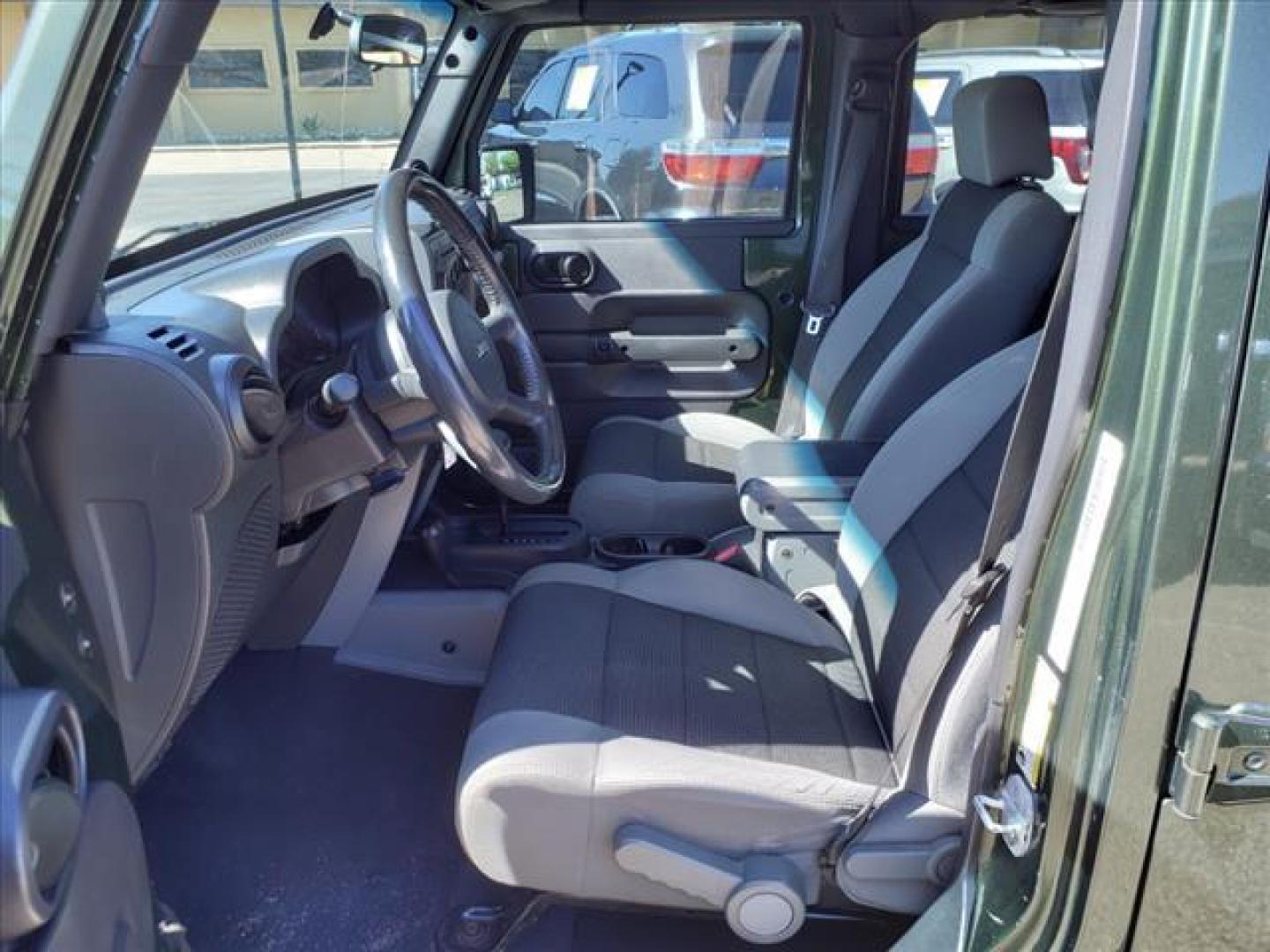 2007 Rescue Green Metallic Clearcoat Jeep Wrangler Unlimited X (1J4GA39137L) with an 3.8L 3.8L V6 205hp 240ft. lbs. Sequential Multiport Fuel Injection engine, 4-Speed Automatic transmission, located at 1401 N. Hobart, Pampa, TX, 79065, (806) 665-9872, 35.549953, -100.975098 - Photo#10