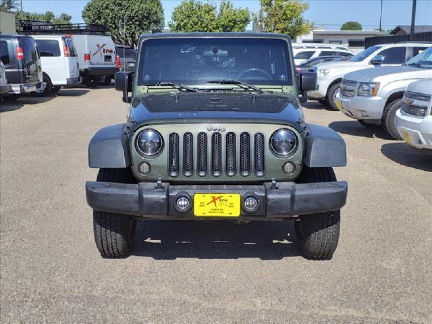 2007 Rescue Green Metallic Clearcoat Jeep Wrangler Unlimited X (1J4GA39137L) with an 3.8L 3.8L V6 205hp 240ft. lbs. Sequential Multiport Fuel Injection engine, 4-Speed Automatic transmission, located at 1401 N. Hobart, Pampa, TX, 79065, (806) 665-9872, 35.549953, -100.975098 - Photo#1