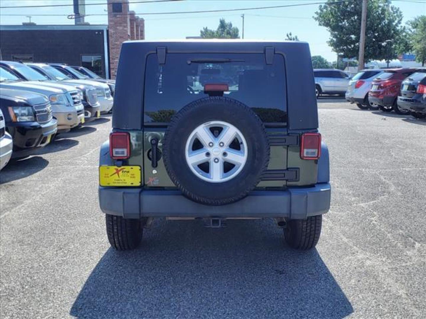 2007 Rescue Green Metallic Clearcoat Jeep Wrangler Unlimited X (1J4GA39137L) with an 3.8L 3.8L V6 205hp 240ft. lbs. Sequential Multiport Fuel Injection engine, 4-Speed Automatic transmission, located at 1401 N. Hobart, Pampa, TX, 79065, (806) 665-9872, 35.549953, -100.975098 - Photo#3