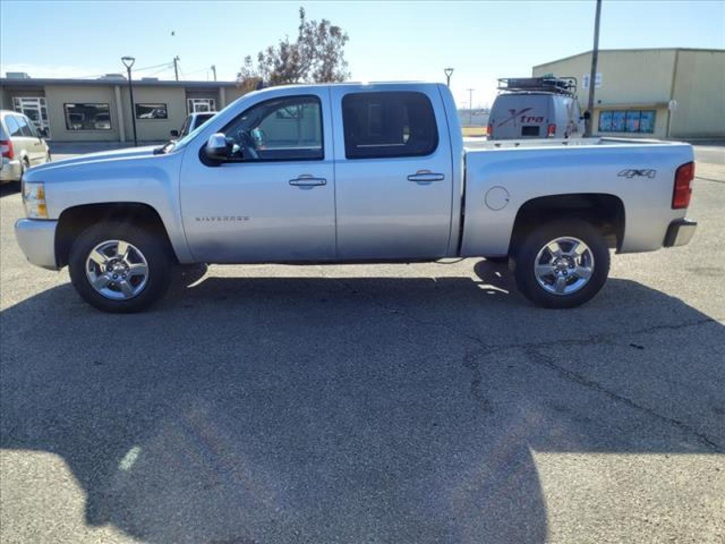 2013 Silver Ice Metallic Chevrolet Silverado 1500 LTZ (3GCPKTE73DG) with an 5.3L Vortec 5.3L Flex Fuel V8 Sequential-Port F.I. engine, 6-Speed Shiftable Automatic transmission, located at 1401 N. Hobart, Pampa, TX, 79065, (806) 665-9872, 35.549953, -100.975098 - Photo#4