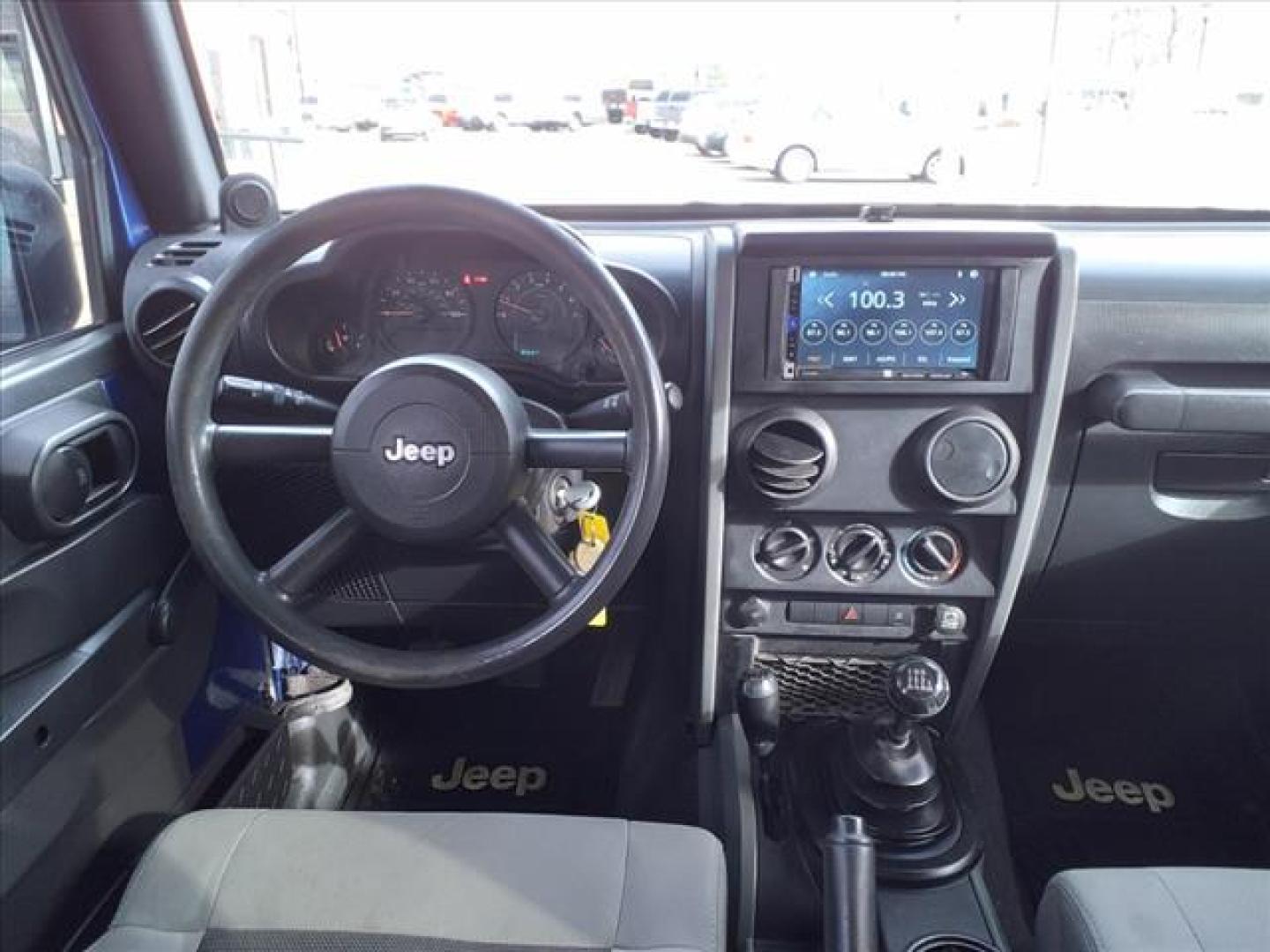 2009 Deep Water Blue Pearl Coat Jeep Wrangler Unlimited X (1J4GA39169L) with an 3.8L 3.8L V6 205hp 240ft. lbs. Sequential Multiport Fuel Injection engine, 6-Speed Manual transmission, located at 1401 N. Hobart, Pampa, TX, 79065, (806) 665-9872, 35.549953, -100.975098 - Photo#8