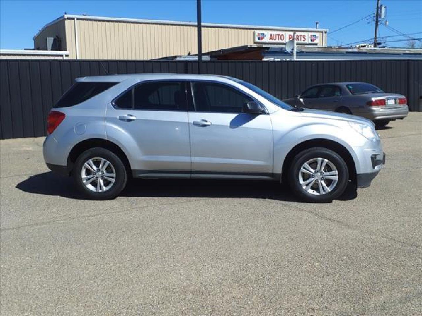 2015 Silver Ice Metallic Chevrolet Equinox LS (1GNALAEKXFZ) with an 2.4L 2.4L I4 182hp 172ft. lbs. Direct Injection engine, 6-Speed Shiftable Automatic transmission, located at 1401 N. Hobart, Pampa, TX, 79065, (806) 665-9872, 35.549953, -100.975098 - Photo#2