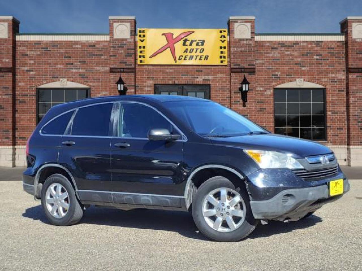 2007 Nighthawk Black Pearl Honda CR-V EX (JHLRE38577C) with an 2.4L 2.4L I4 166hp 161ft. lbs. Sequential Multiport Fuel Injection engine, 5-Speed Automatic transmission, located at 1401 N. Hobart, Pampa, TX, 79065, (806) 665-9872, 35.549953, -100.975098 - Photo#0