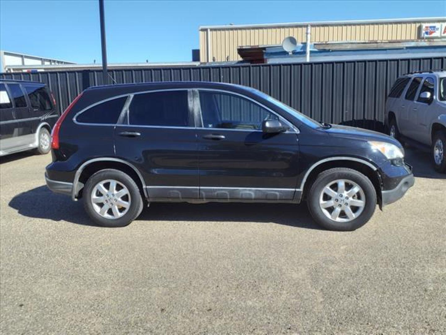 2007 Nighthawk Black Pearl Honda CR-V EX (JHLRE38577C) with an 2.4L 2.4L I4 166hp 161ft. lbs. Sequential Multiport Fuel Injection engine, 5-Speed Automatic transmission, located at 1401 N. Hobart, Pampa, TX, 79065, (806) 665-9872, 35.549953, -100.975098 - Photo#2