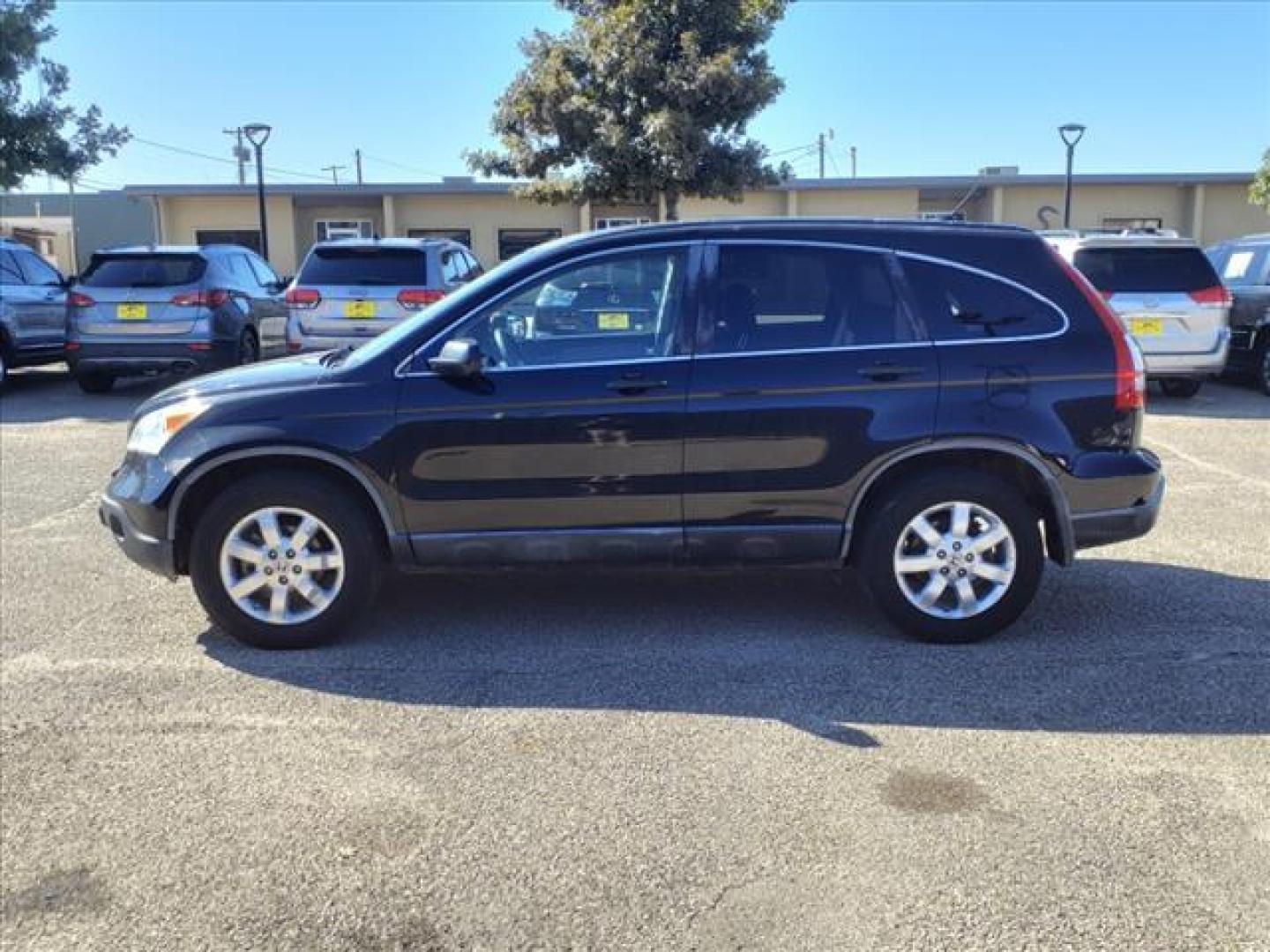 2007 Nighthawk Black Pearl Honda CR-V EX (JHLRE38577C) with an 2.4L 2.4L I4 166hp 161ft. lbs. Sequential Multiport Fuel Injection engine, 5-Speed Automatic transmission, located at 1401 N. Hobart, Pampa, TX, 79065, (806) 665-9872, 35.549953, -100.975098 - Photo#4