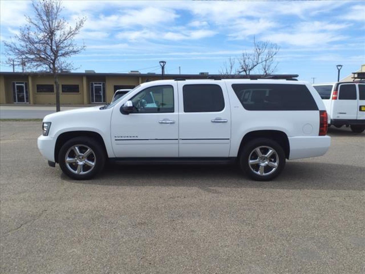 2012 Summit White Chevrolet Suburban LTZ (1GNSKKE77CR) with an 5.3L Vortec Aluminum Block 5.3L Flex Fuel V8 320hp 335ft. lbs. Sequential-Port F.I. engine, 6-Speed Shiftable Automatic transmission, located at 1401 N. Hobart, Pampa, TX, 79065, (806) 665-9872, 35.549953, -100.975098 - Photo#4