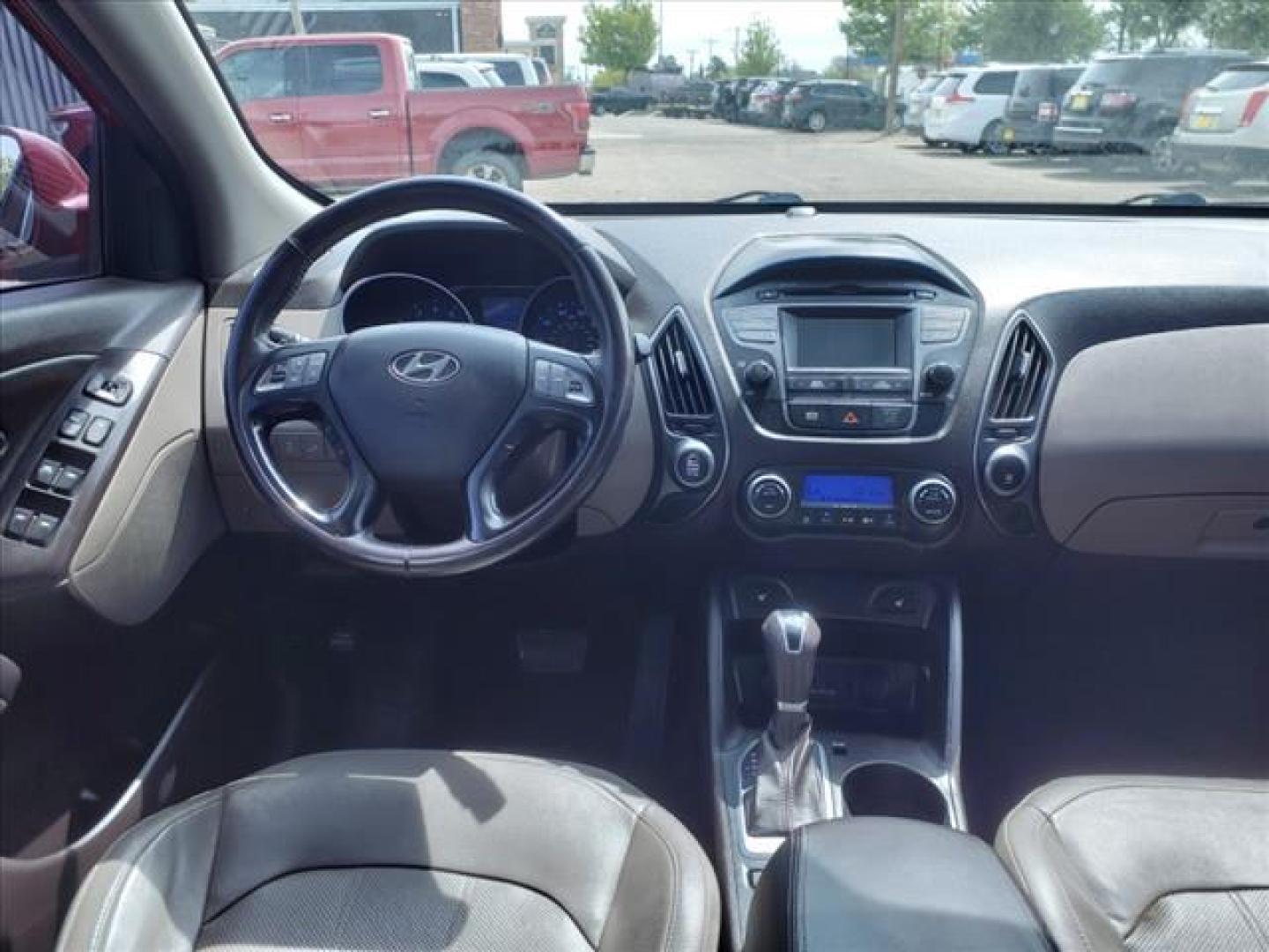 2014 Garnet Red Hyundai TUCSON Limited (KM8JUCAG2EU) with an 2.4L 2.4L I4 182hp 177ft. lbs. Direct Injection engine, 6-Speed Shiftable Automatic transmission, located at 1401 N. Hobart, Pampa, TX, 79065, (806) 665-9872, 35.549953, -100.975098 - Photo#10