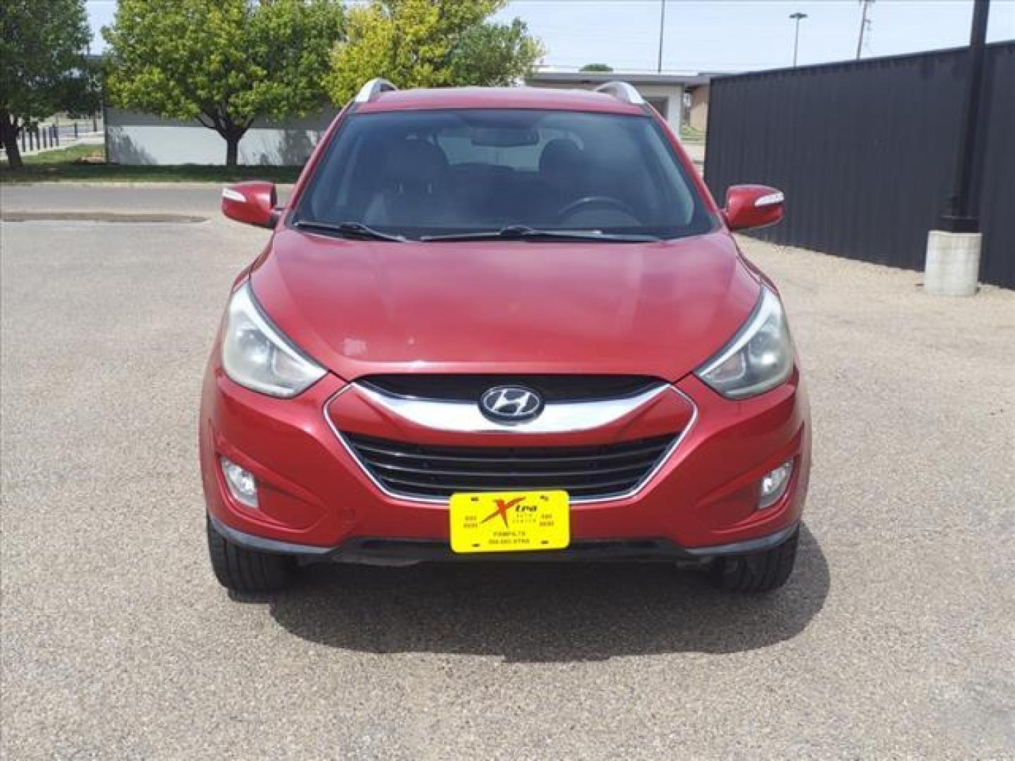 2014 Garnet Red Hyundai TUCSON Limited (KM8JUCAG2EU) with an 2.4L 2.4L I4 182hp 177ft. lbs. Direct Injection engine, 6-Speed Shiftable Automatic transmission, located at 1401 N. Hobart, Pampa, TX, 79065, (806) 665-9872, 35.549953, -100.975098 - Photo#1