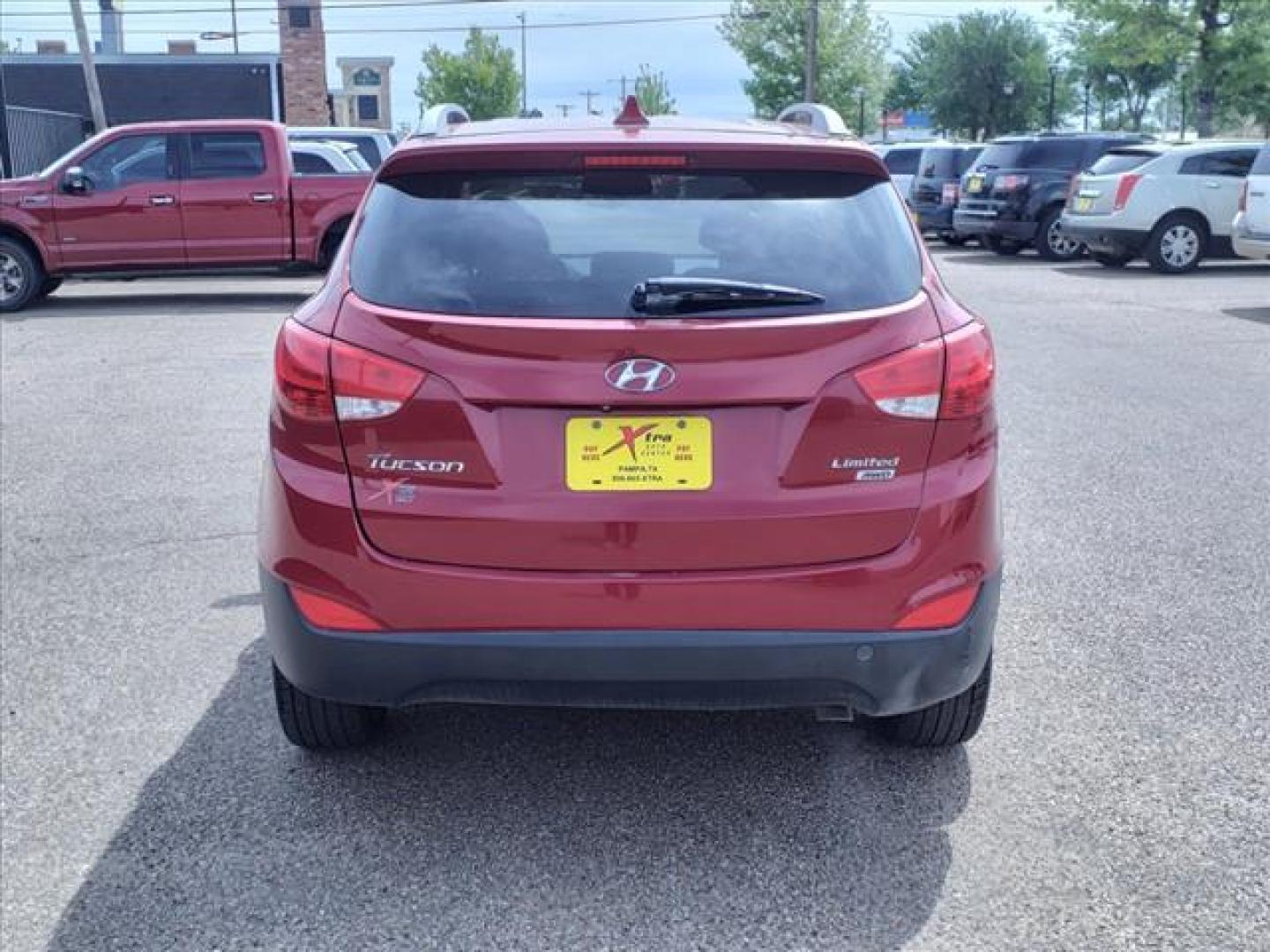 2014 Garnet Red Hyundai TUCSON Limited (KM8JUCAG2EU) with an 2.4L 2.4L I4 182hp 177ft. lbs. Direct Injection engine, 6-Speed Shiftable Automatic transmission, located at 1401 N. Hobart, Pampa, TX, 79065, (806) 665-9872, 35.549953, -100.975098 - Photo#3