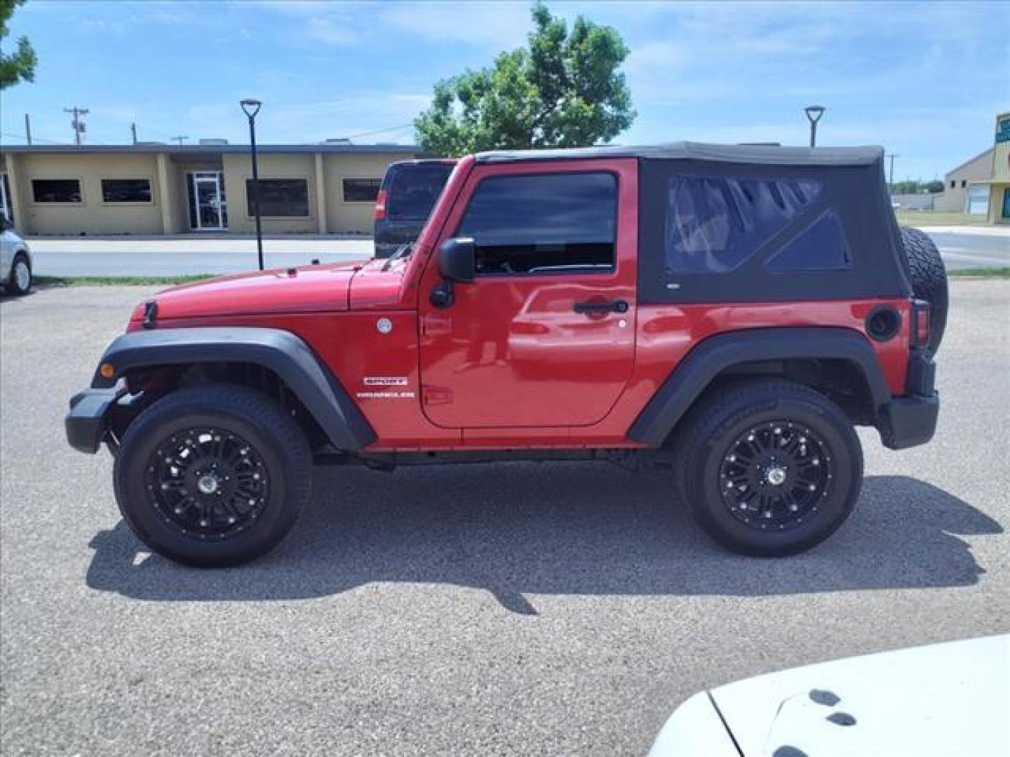 2011 Flame Red Clear Coat Jeep Wrangler Sport (1J4AA2D10BL) with an 3.8L 3.8L V6 202hp 237ft. lbs. Sequential Multiport Fuel Injection engine, 6-Speed Manual transmission, located at 1401 N. Hobart, Pampa, TX, 79065, (806) 665-9872, 35.549953, -100.975098 - Photo#4