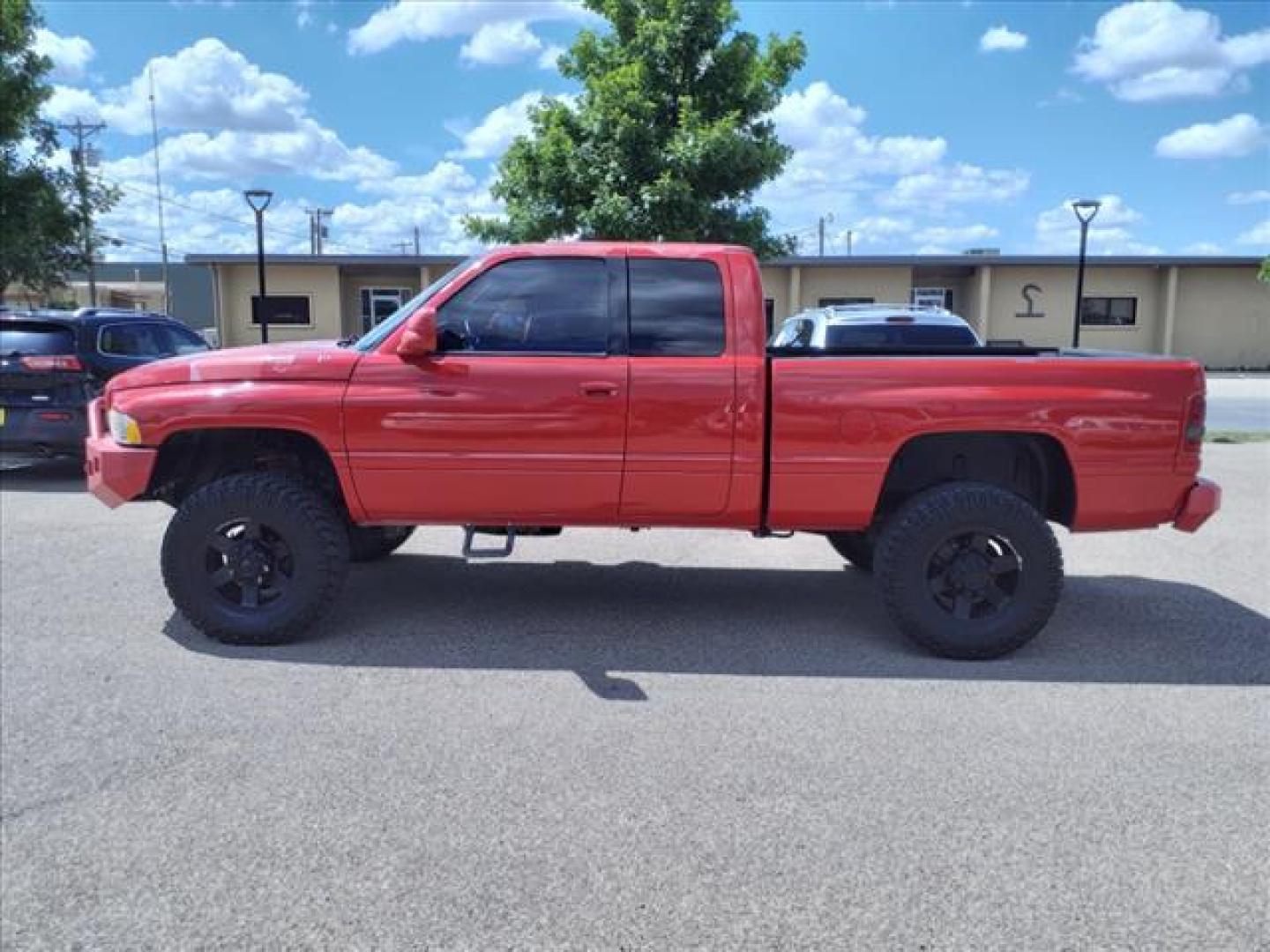 2001 Red Dodge Ram 2500 SLT (1B7KF23671J) with an 5.9L Cummins 5.9L Diesel Turbo I6 235hp 460ft. lbs. Direct Injection engine, 4-Speed Automatic transmission, located at 1401 N. Hobart, Pampa, TX, 79065, (806) 665-9872, 35.549953, -100.975098 - Photo#4