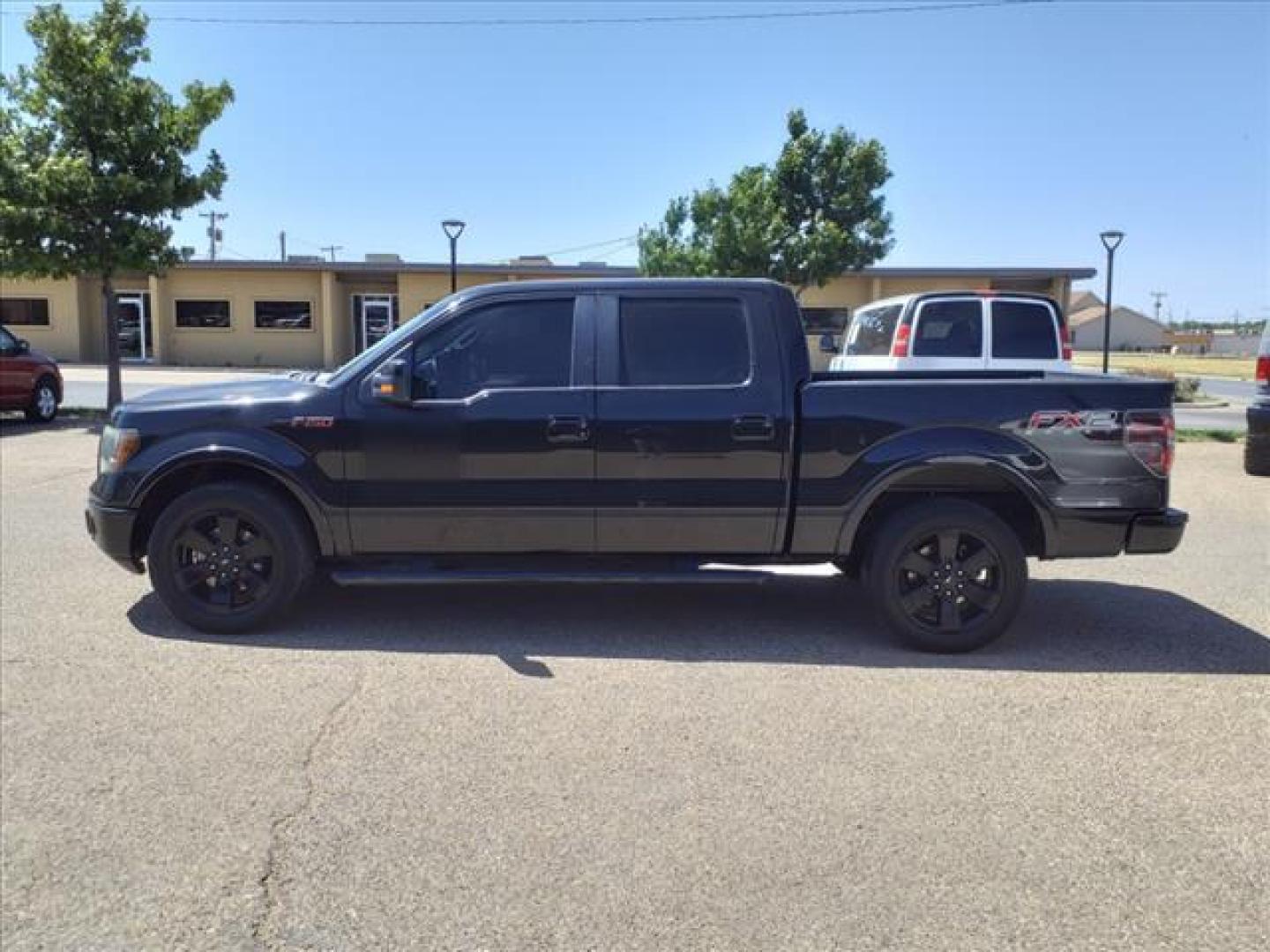 2012 Tuxedo Black Metallic Ford F-150 FX2 (1FTFW1CF8CF) with an 5.0L 5.0L Flex Fuel V8 360hp 380ft. lbs. Sequential Multiport Fuel Injection engine, 6-Speed Shiftable Automatic transmission, located at 1401 N. Hobart, Pampa, TX, 79065, (806) 665-9872, 35.549953, -100.975098 - Photo#4