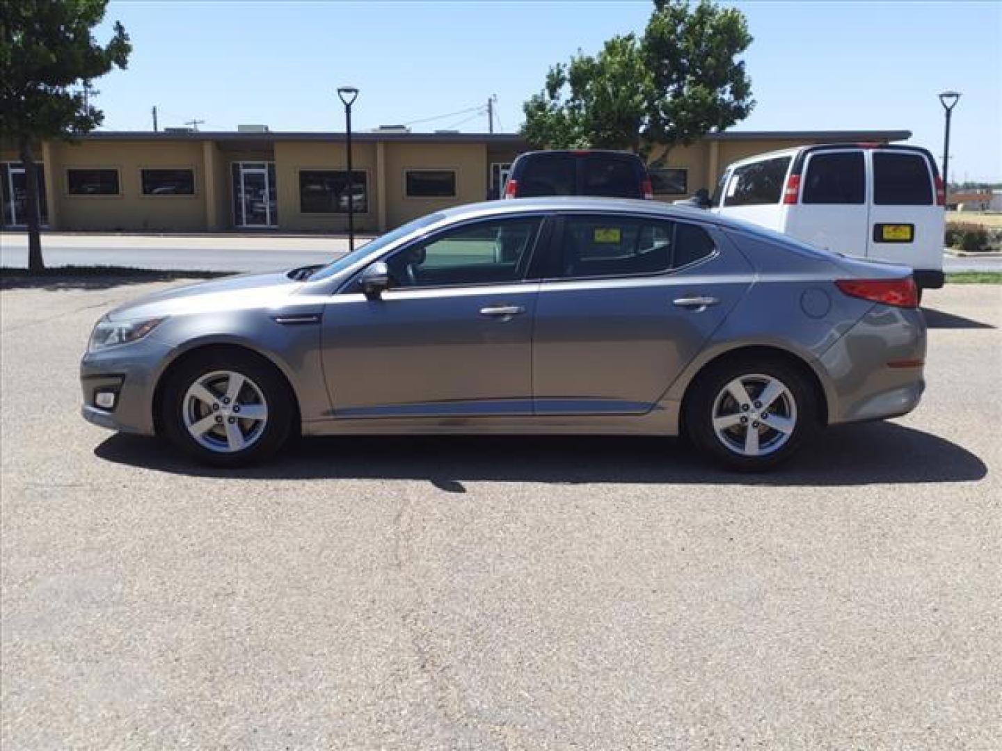 2015 Titanium Kia Optima LX (5XXGM4A73FG) with an 2.4L 2.4L I4 192hp 181ft. lbs. Direct Injection engine, 6-Speed Shiftable Automatic transmission, located at 1401 N. Hobart, Pampa, TX, 79065, (806) 665-9872, 35.549953, -100.975098 - Photo#4