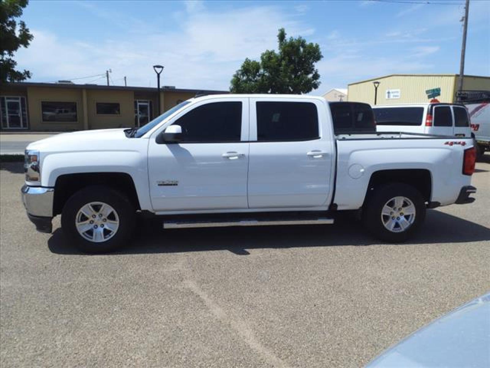 2018 Summit White Chevrolet Silverado 1500 LT (3GCUKREC7JG) with an 5.3L EcoTec3 5.3L V8 355hp 383ft. lbs. Direct Injection engine, 6-Speed Shiftable Automatic w/Overdrive transmission, located at 1401 N. Hobart, Pampa, TX, 79065, (806) 665-9872, 35.549953, -100.975098 - Photo #4
