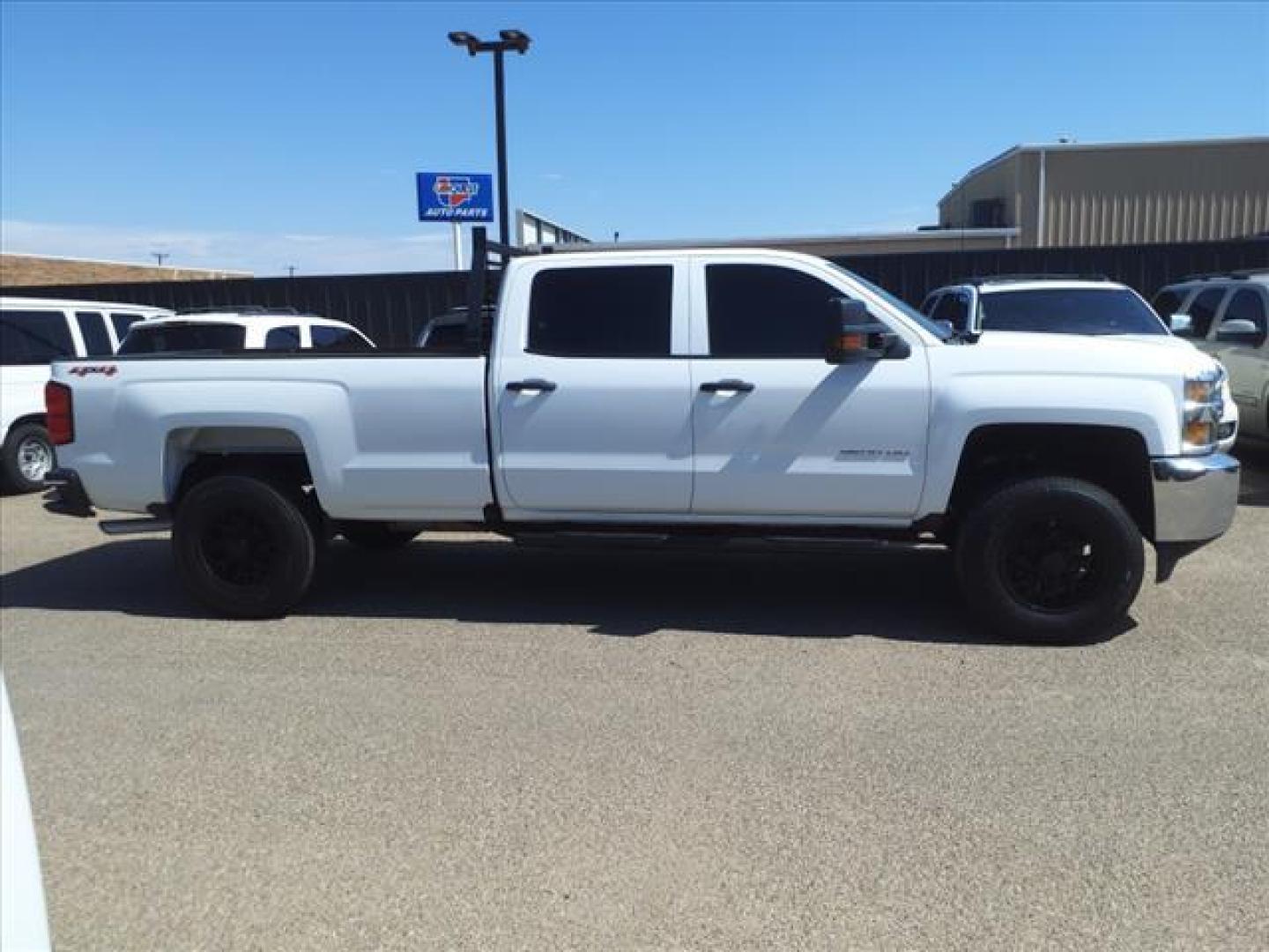 2019 Summit White Chevrolet Silverado 2500HD Work Truck (1GC1KREGXKF) with an 6.0L Vortec 6.0L Flex Fuel V8 360hp 380ft. lbs. Sequential Electronic Fuel Injection engine, 6-Speed Shiftable Automatic transmission, located at 1401 N. Hobart, Pampa, TX, 79065, (806) 665-9872, 35.549953, -100.975098 - Photo#2