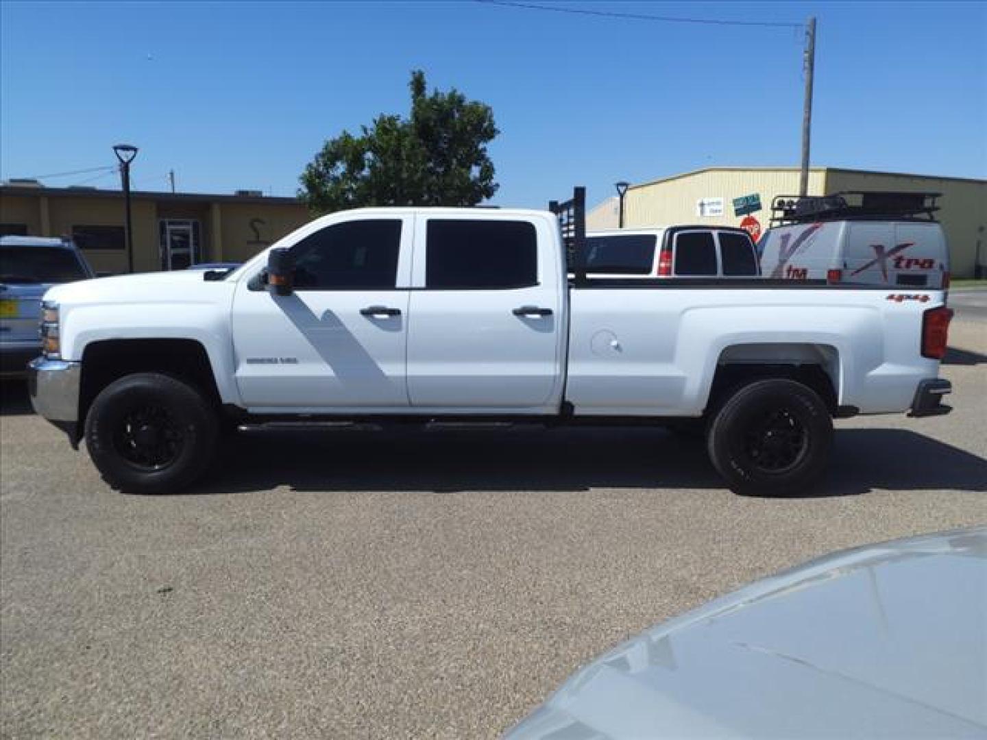 2019 Summit White Chevrolet Silverado 2500HD Work Truck (1GC1KREGXKF) with an 6.0L Vortec 6.0L Flex Fuel V8 360hp 380ft. lbs. Sequential Electronic Fuel Injection engine, 6-Speed Shiftable Automatic transmission, located at 1401 N. Hobart, Pampa, TX, 79065, (806) 665-9872, 35.549953, -100.975098 - Photo#4