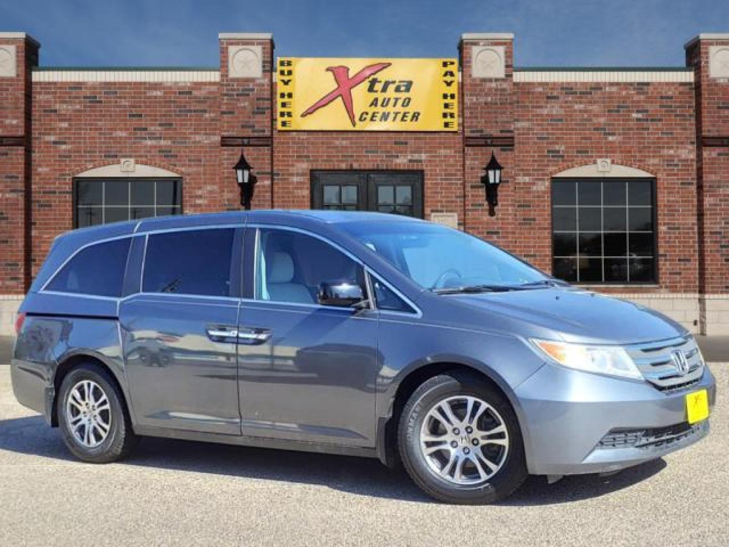 2012 Polished Metal Metallic Honda Odyssey EX (5FNRL5H40CB) with an 3.5L 3.5L V6 248hp 250ft. lbs. Sequential Multiport Fuel Injection engine, 5-Speed Automatic transmission, located at 1401 N. Hobart, Pampa, TX, 79065, (806) 665-9872, 35.549953, -100.975098 - Photo#0