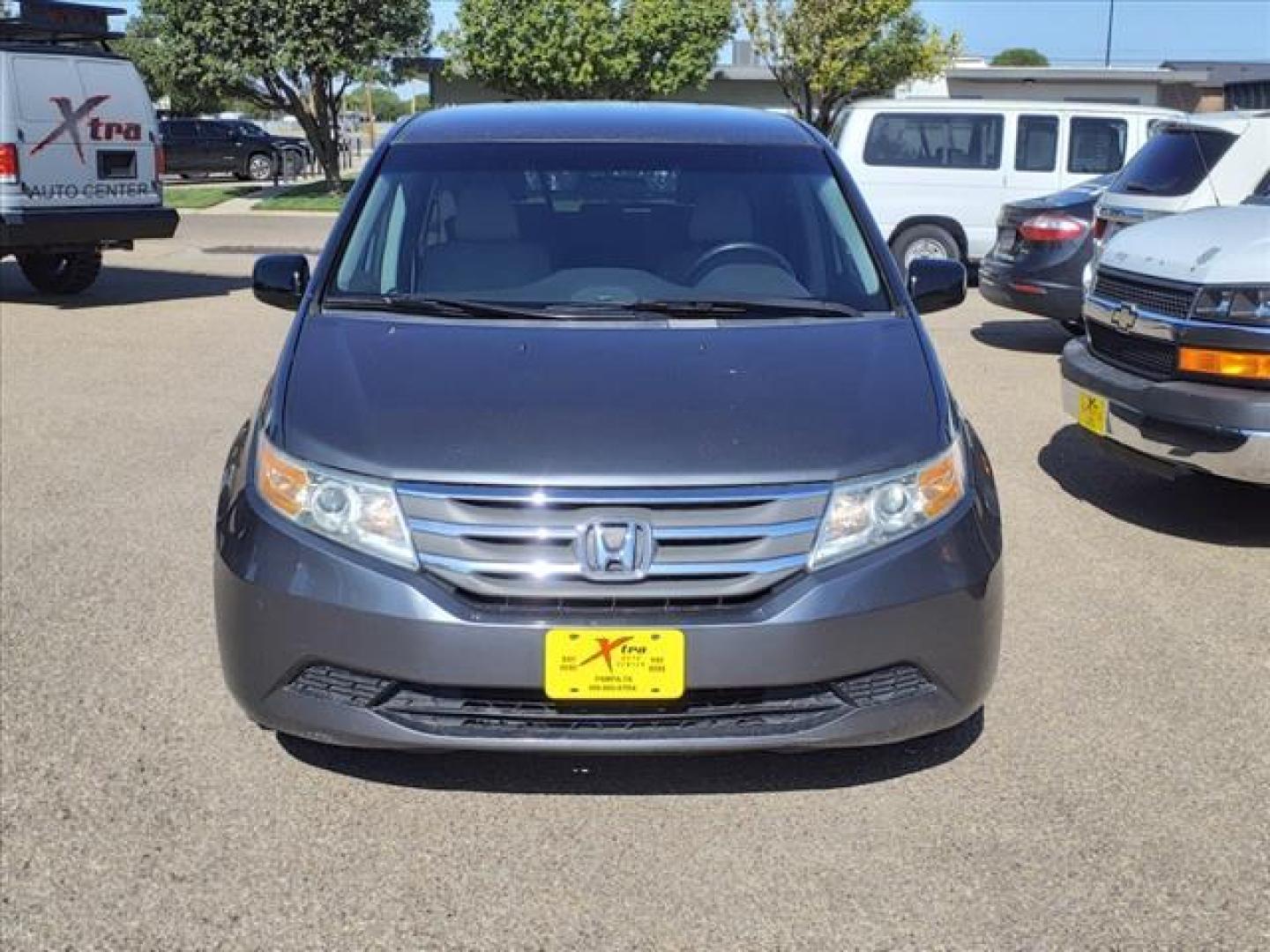 2012 Polished Metal Metallic Honda Odyssey EX (5FNRL5H40CB) with an 3.5L 3.5L V6 248hp 250ft. lbs. Sequential Multiport Fuel Injection engine, 5-Speed Automatic transmission, located at 1401 N. Hobart, Pampa, TX, 79065, (806) 665-9872, 35.549953, -100.975098 - Photo#1