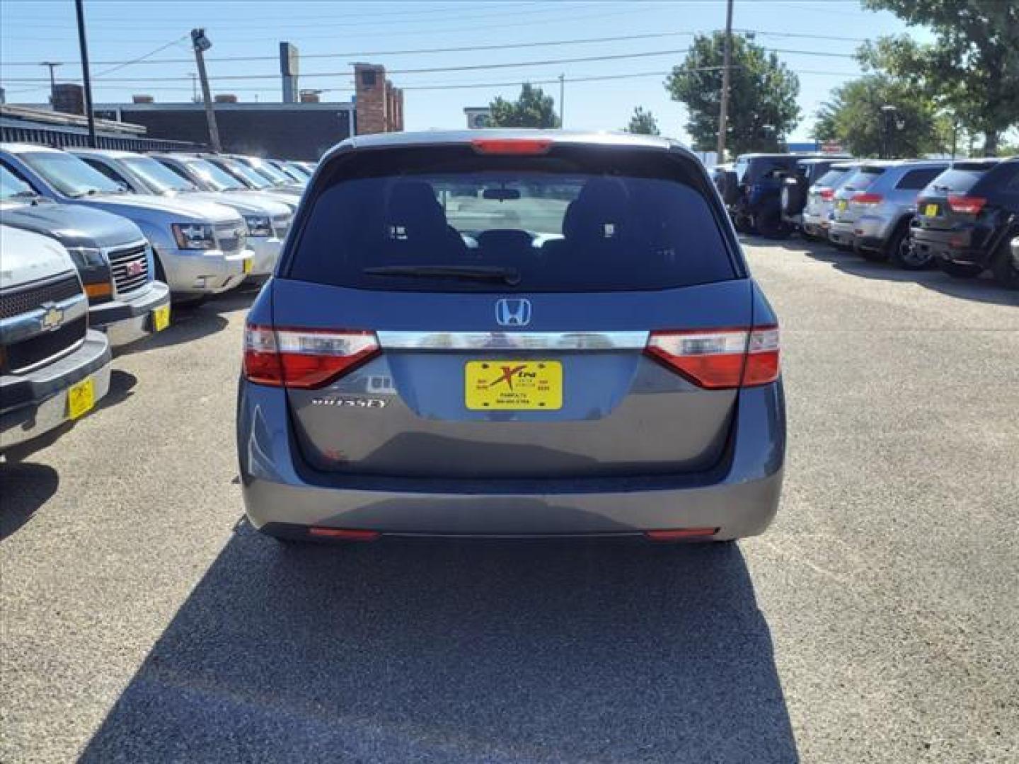 2012 Polished Metal Metallic Honda Odyssey EX (5FNRL5H40CB) with an 3.5L 3.5L V6 248hp 250ft. lbs. Sequential Multiport Fuel Injection engine, 5-Speed Automatic transmission, located at 1401 N. Hobart, Pampa, TX, 79065, (806) 665-9872, 35.549953, -100.975098 - Photo#3