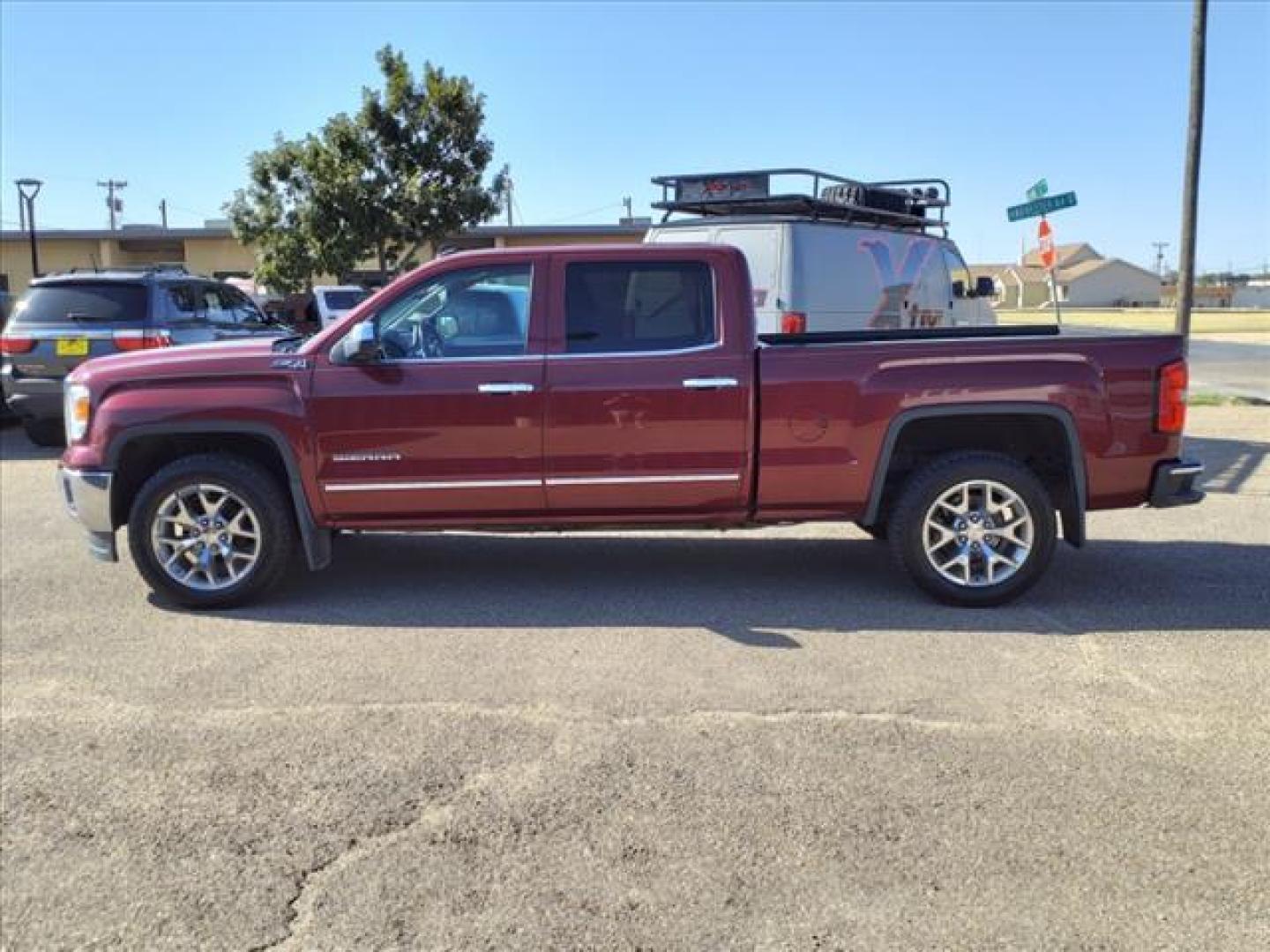 2014 Sonoma Red Metallic GMC Sierra 1500 SLT (3GTU2VEJ0EG) with an 6.2L EcoTec3 6.2L V8 420hp 460ft. lbs. Direct Injection engine, 6-Speed Shiftable Automatic w/Overdrive transmission, located at 1401 N. Hobart, Pampa, TX, 79065, (806) 665-9872, 35.549953, -100.975098 - Photo#4