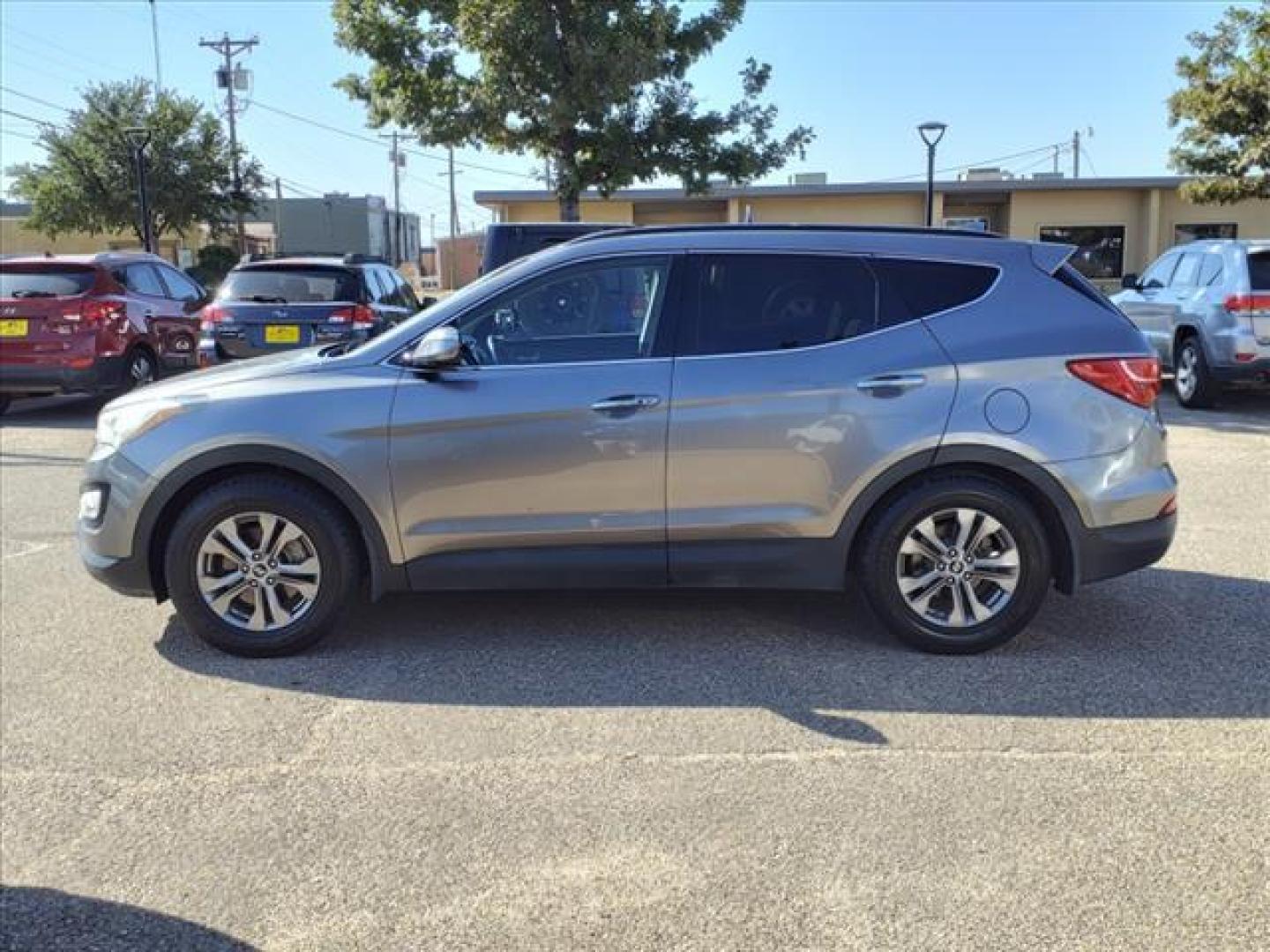 2014 Mineral Gray Hyundai SANTA FE Sport 2.4L (5XYZU3LB7EG) with an 2.4L 2.4L I4 190hp 181ft. lbs. Direct Injection engine, 6-Speed Shiftable Automatic transmission, located at 1401 N. Hobart, Pampa, TX, 79065, (806) 665-9872, 35.549953, -100.975098 - Photo#4