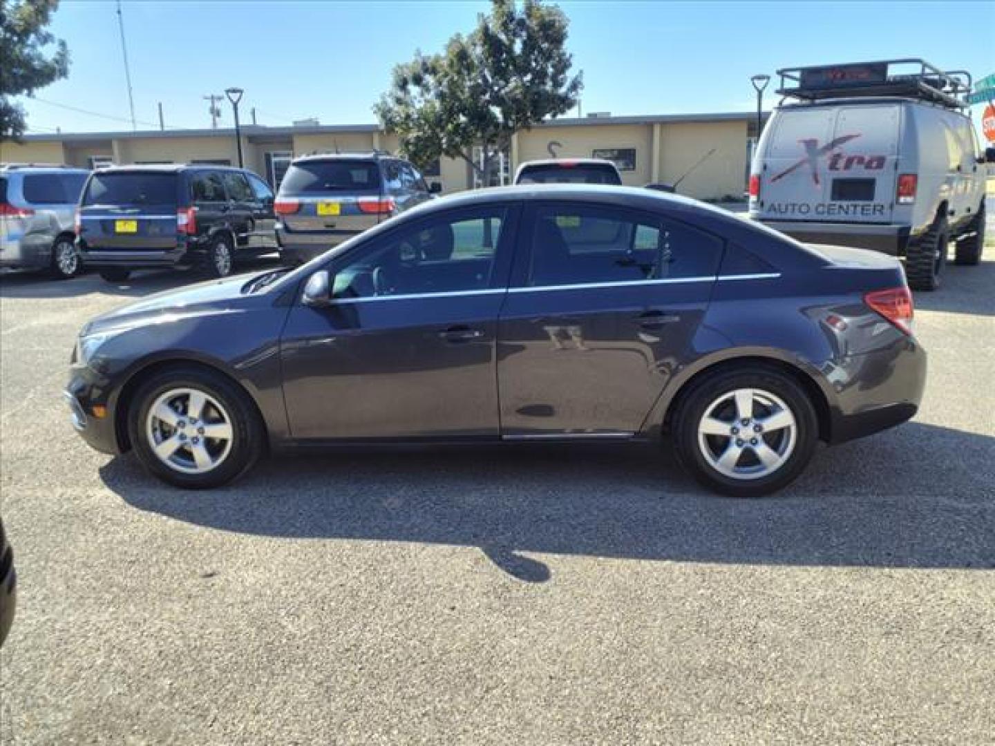 2015 Tungsten Metallic Chevrolet Cruze 1LT Auto (1G1PC5SB2F7) with an 1.4L Ecotec 1.4L Turbo I4 138hp 148ft. lbs. Sequential Multiport Fuel Injection engine, 6-Speed Shiftable Automatic w/Overdrive transmission, located at 1401 N. Hobart, Pampa, TX, 79065, (806) 665-9872, 35.549953, -100.975098 - Photo#4