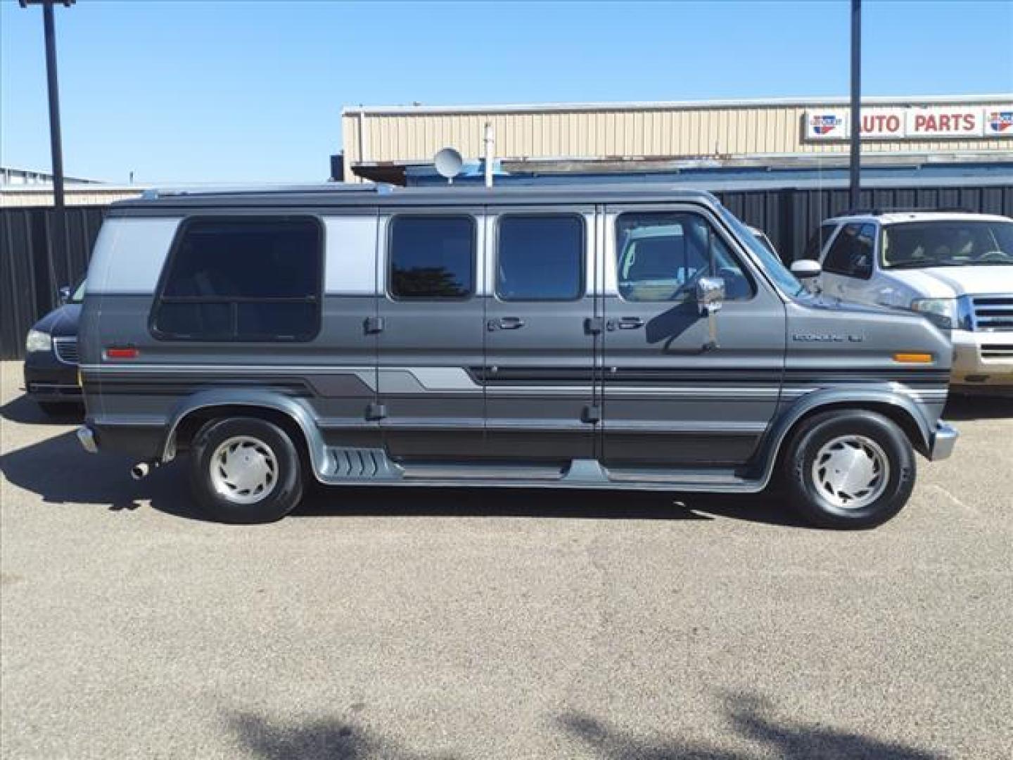 1990 Gray Ford E-150 Bivouac (1FDEE14H6LH) with an 8 Cylinder Fuel Injected engine, Automatic transmission, located at 1401 N. Hobart, Pampa, TX, 79065, (806) 665-9872, 35.549953, -100.975098 - Photo#2