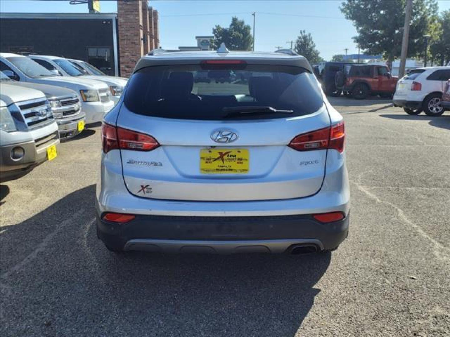 2014 Moonstone Silver Hyundai SANTA FE Sport 2.4L (5XYZU3LB3EG) with an 2.4L 2.4L I4 190hp 181ft. lbs. Direct Injection engine, 6-Speed Shiftable Automatic transmission, located at 1401 N. Hobart, Pampa, TX, 79065, (806) 665-9872, 35.549953, -100.975098 - Photo#3