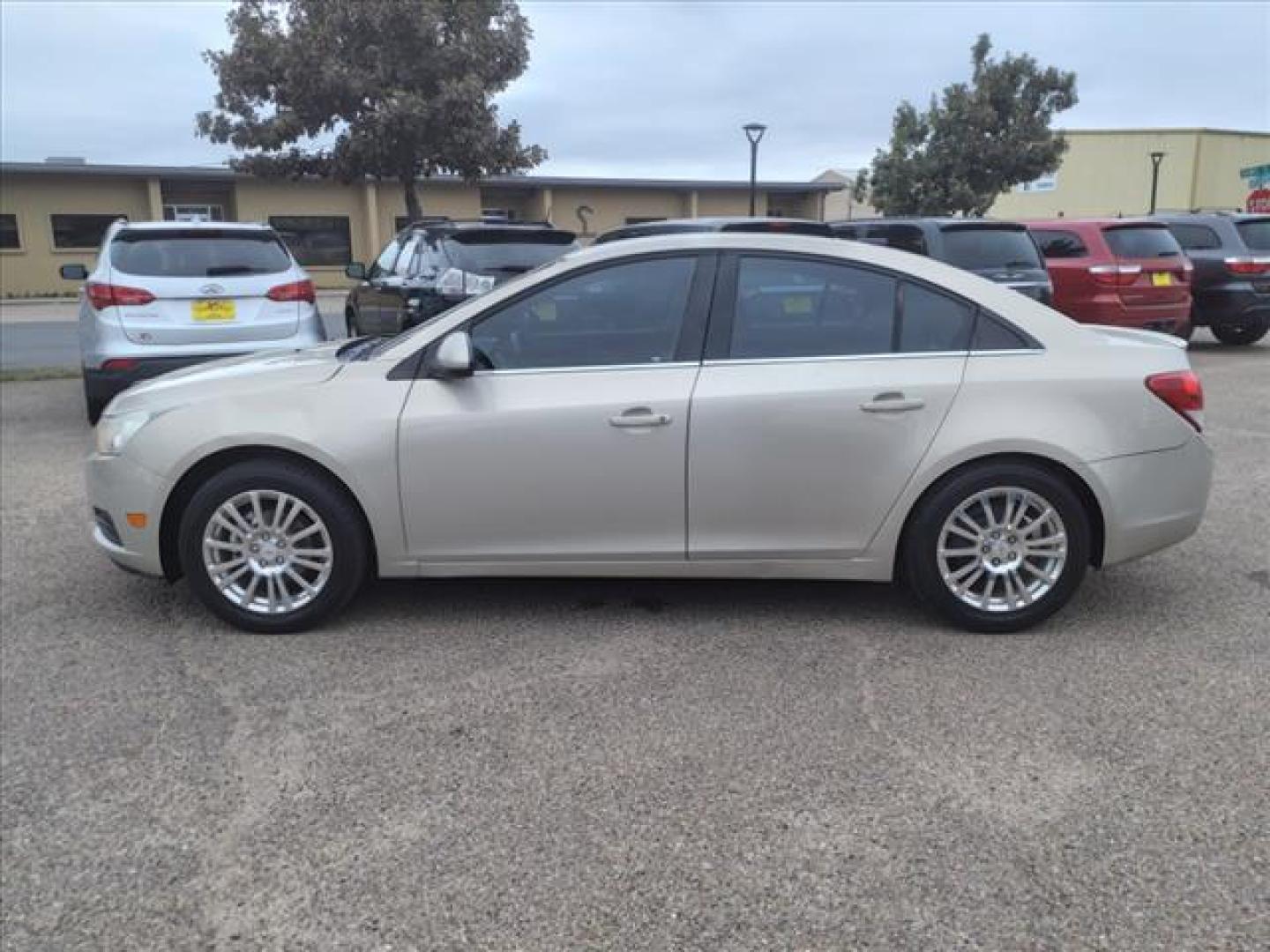 2011 Gold Mist Metallic Chevrolet Cruze ECO (1G1PJ5S92B7) with an 1.4L Ecotec 1.4L Turbo I4 138hp 148ft. lbs. Sequential Multiport Fuel Injection engine, 6-Speed Shiftable Automatic transmission, located at 1401 N. Hobart, Pampa, TX, 79065, (806) 665-9872, 35.549953, -100.975098 - Photo#4