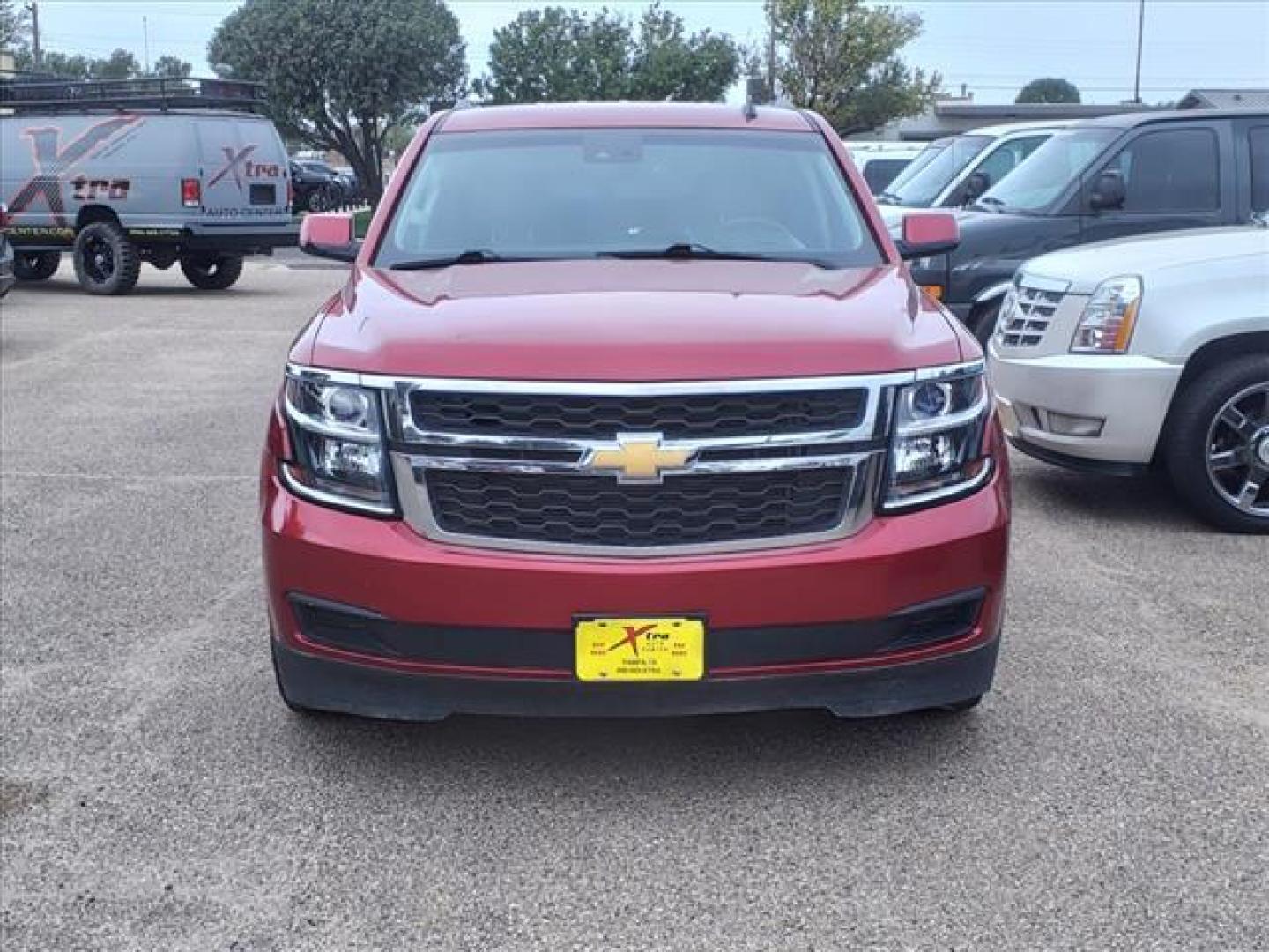 2015 Crystal Red Tintcoat Chevrolet Suburban LT (1GNSKJKC5FR) with an 5.3L EcoTec3 5.3L Flex Fuel V8 355hp 383ft. lbs. Direct Injection engine, 6-Speed Shiftable Automatic w/Overdrive transmission, located at 1401 N. Hobart, Pampa, TX, 79065, (806) 665-9872, 35.549953, -100.975098 - Photo#1