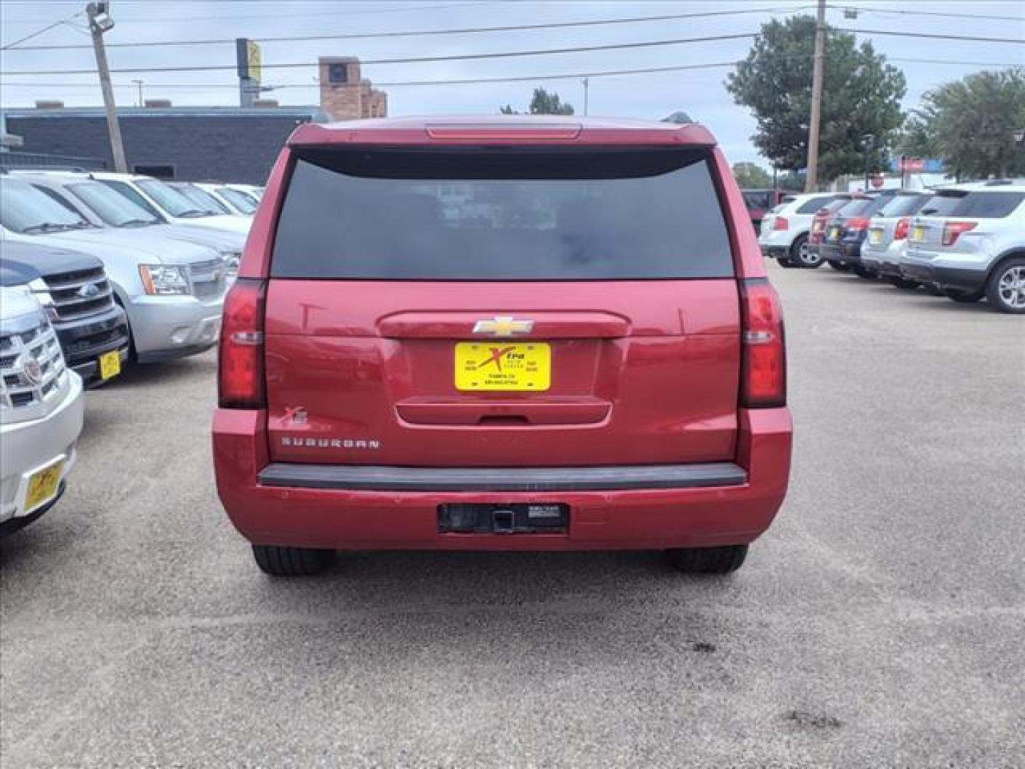 2015 Crystal Red Tintcoat Chevrolet Suburban LT (1GNSKJKC5FR) with an 5.3L EcoTec3 5.3L Flex Fuel V8 355hp 383ft. lbs. Direct Injection engine, 6-Speed Shiftable Automatic w/Overdrive transmission, located at 1401 N. Hobart, Pampa, TX, 79065, (806) 665-9872, 35.549953, -100.975098 - Photo#3