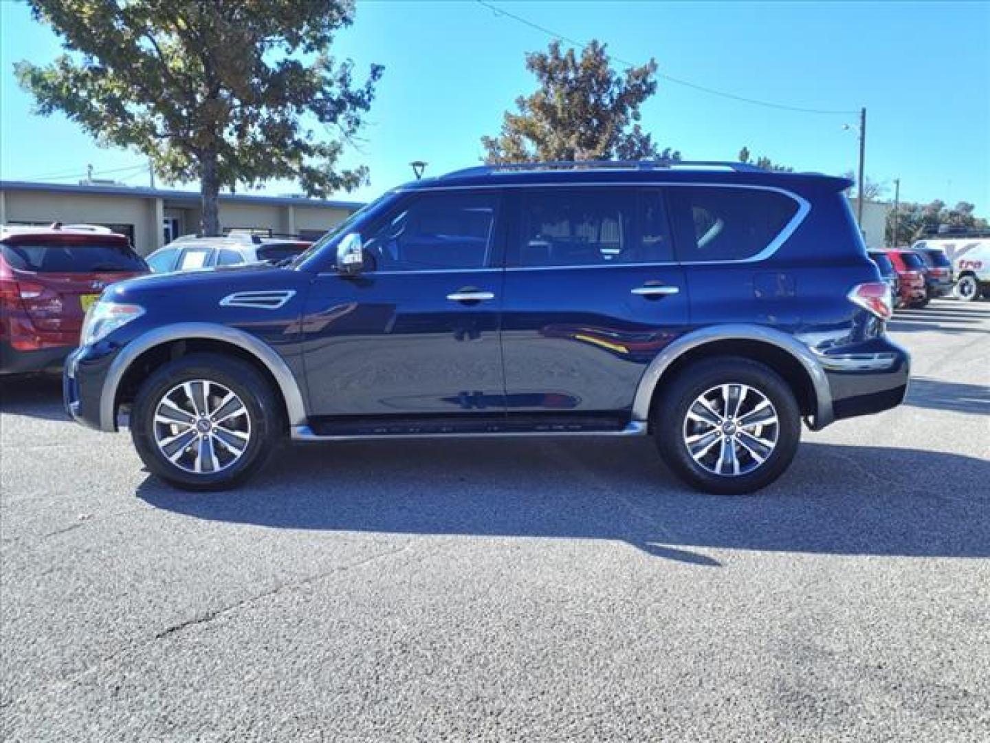 2019 Hermosa Blue Pearl Bw5 Nissan Armada SL (JN8AY2ND6K9) with an 5.6L 5.6L V8 390hp 394ft. lbs. Direct Injection engine, 7-Speed Shiftable Automatic transmission, located at 1401 N. Hobart, Pampa, TX, 79065, (806) 665-9872, 35.549953, -100.975098 - Photo#4