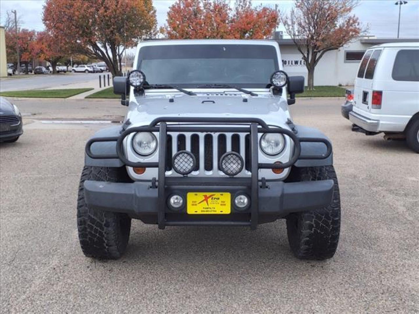 2012 Bright Silver Metallic Clear Coat Ps2 Jeep Wrangler Unlimited Sport (1C4BJWDG7CL) with an 3.6L 3.6L V6 285hp 260ft. lbs. Sequential Multiport Fuel Injection engine, 6-Speed Manual transmission, located at 1401 N. Hobart, Pampa, TX, 79065, (806) 665-9872, 35.549953, -100.975098 - Photo#1